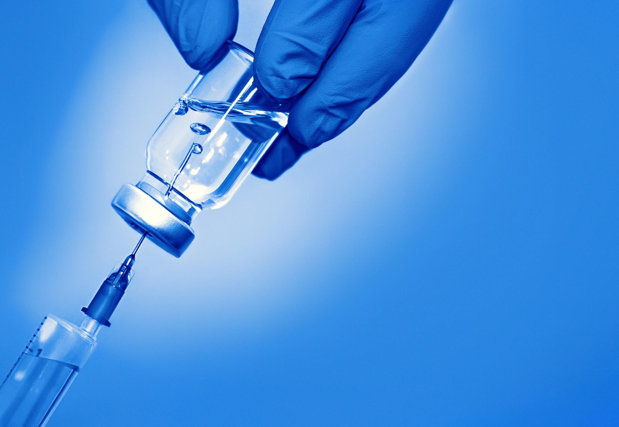 Vaccine bottle and syringe image