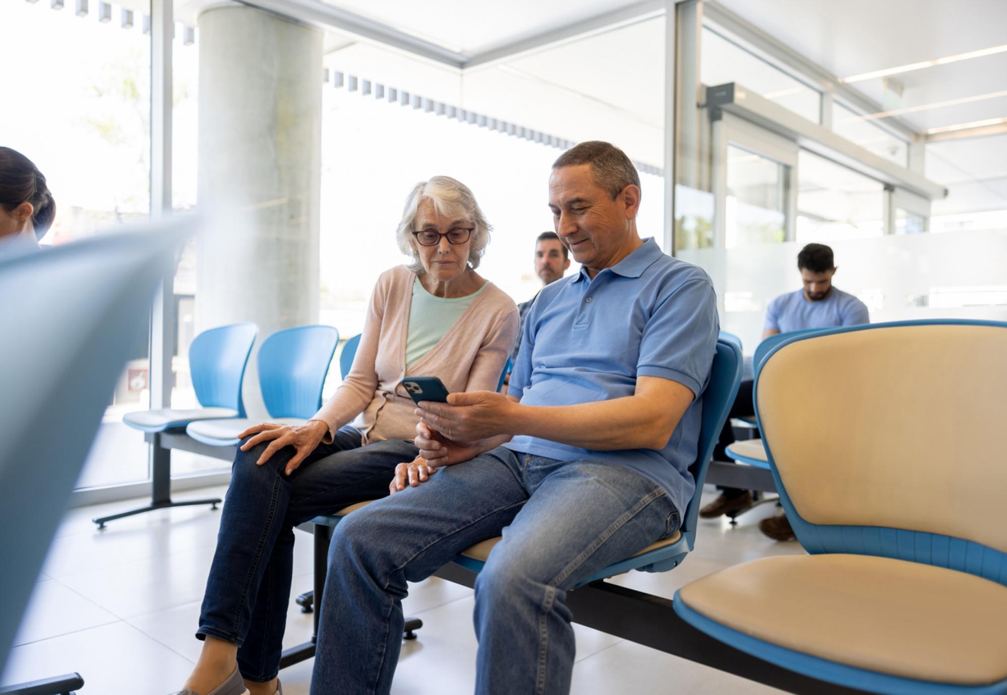 Man and woman in hospital waiting room
