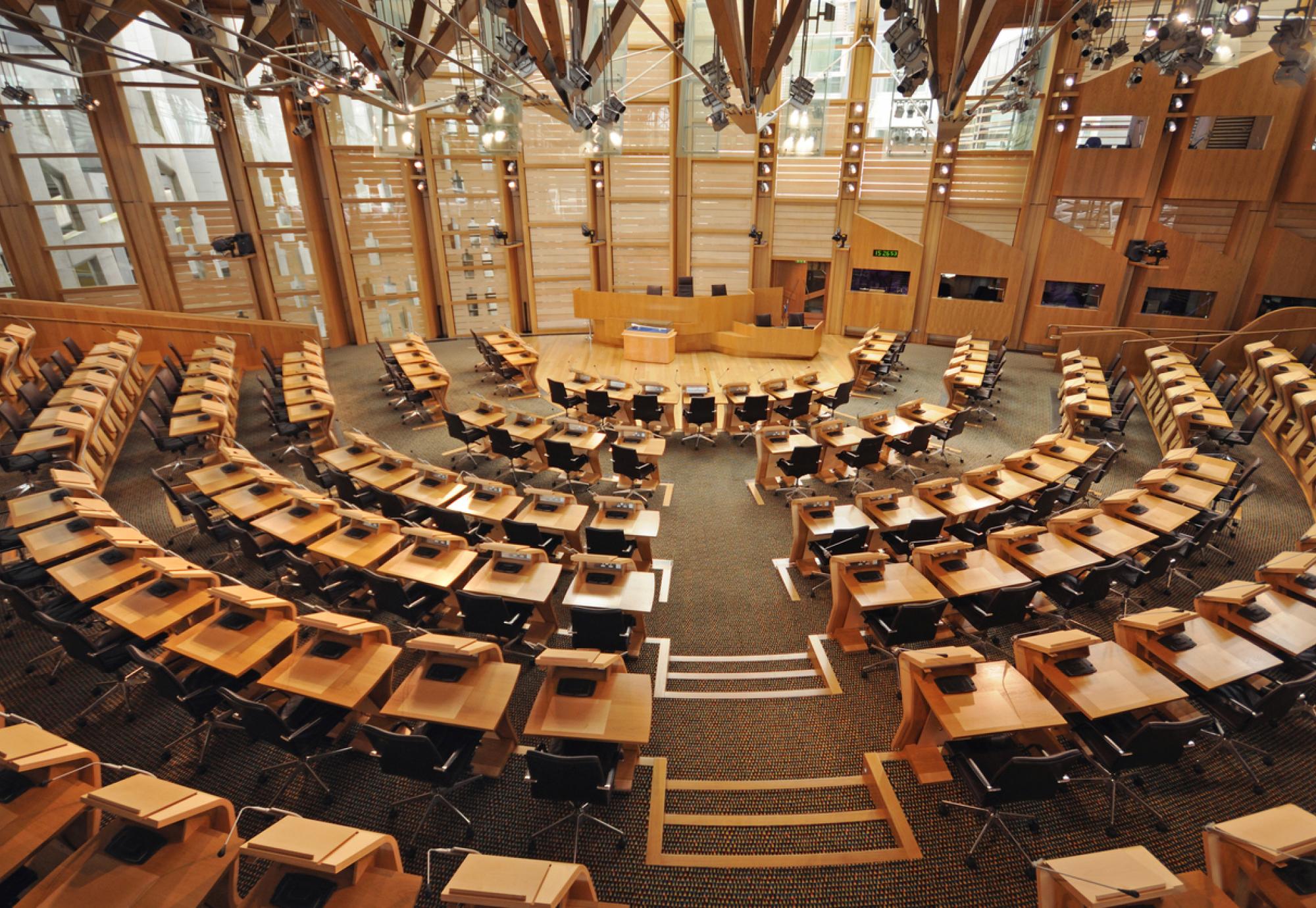 Inside Scottish Parliament depicting the unanimous passing of the patient safety commissioner bill