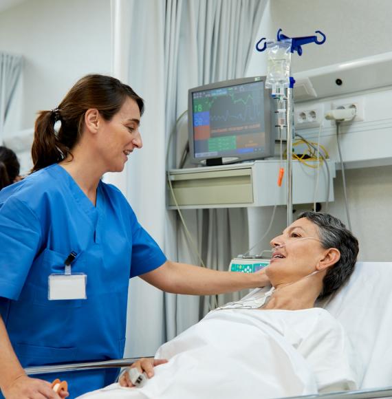 Female nurse checking on a patient