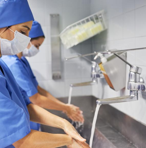 Surgeons washing hands