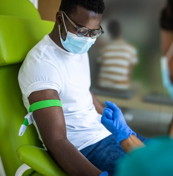 Black man donating blood