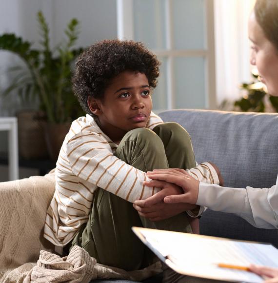 Young boy receiving mental health support