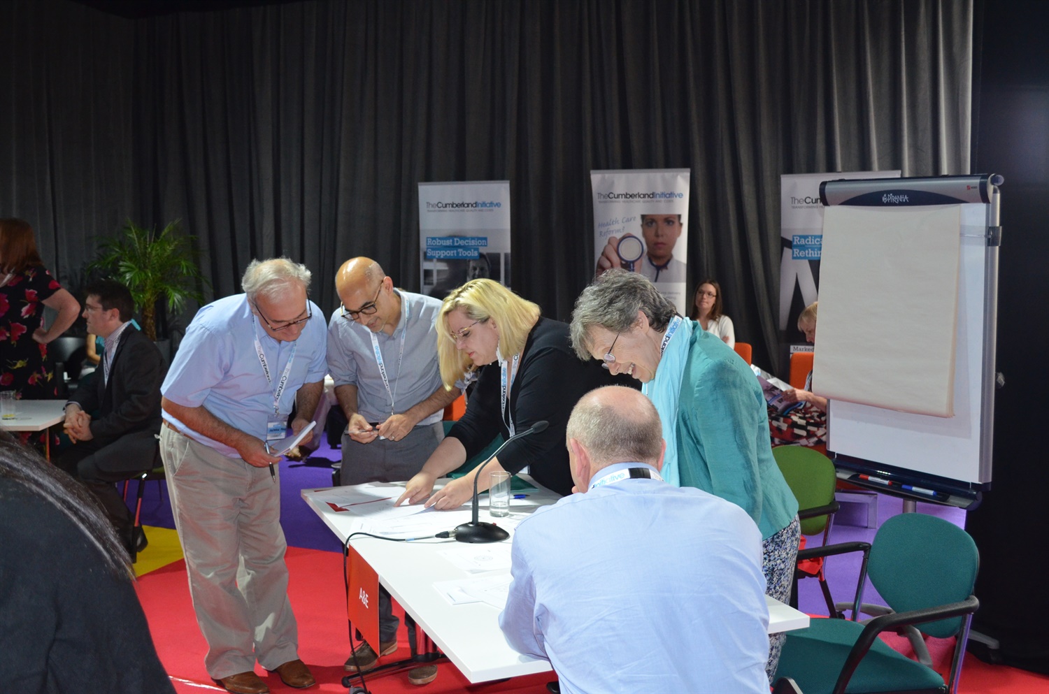 guests - clinicians, academics and computer companies, playing a timed simulation game on meeting AandE targets.  (1)
