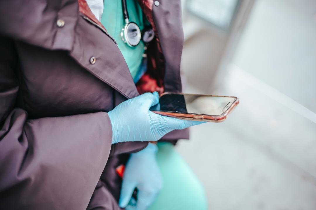 Health worker using the phone