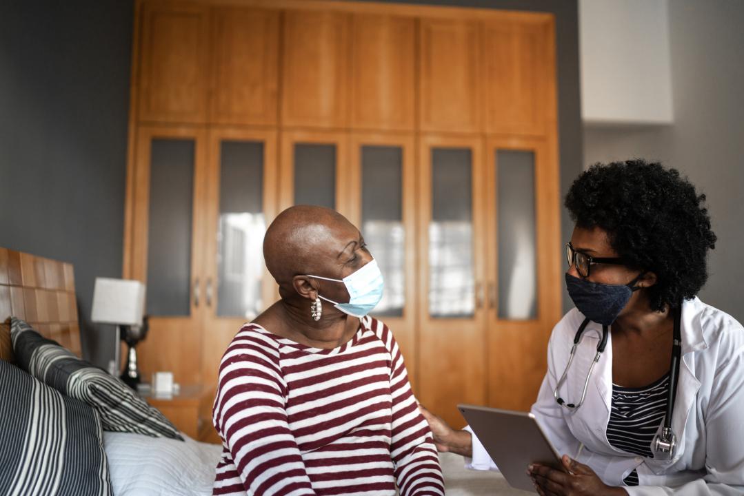 Health worker with a woman