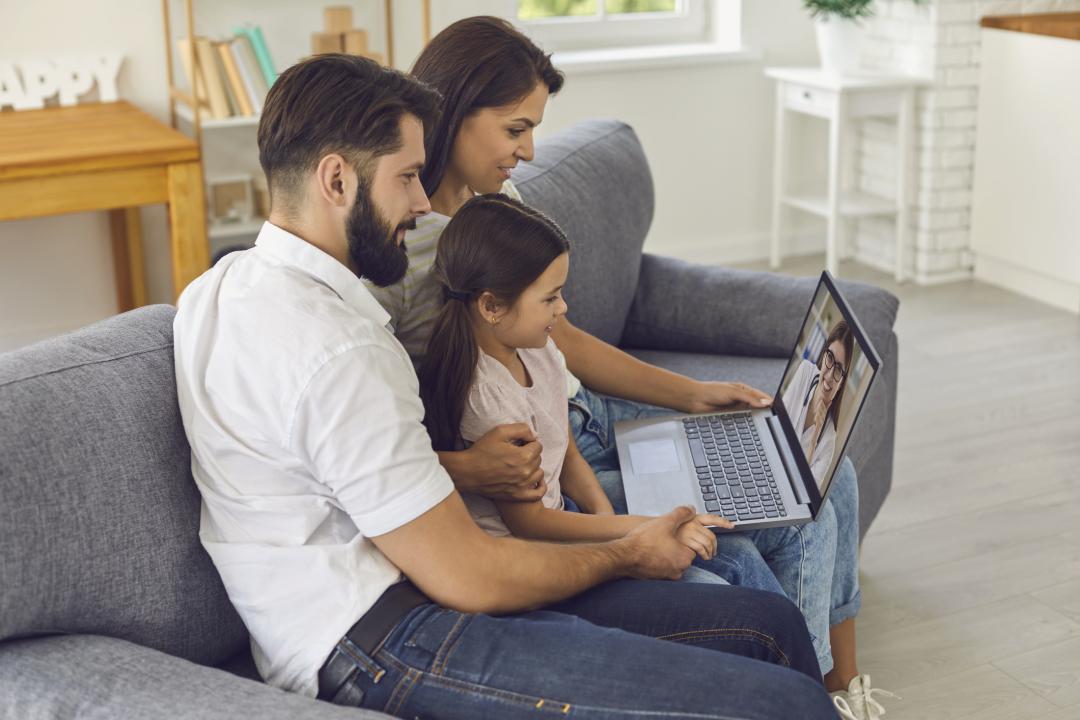 Family on a video call with a medical professional