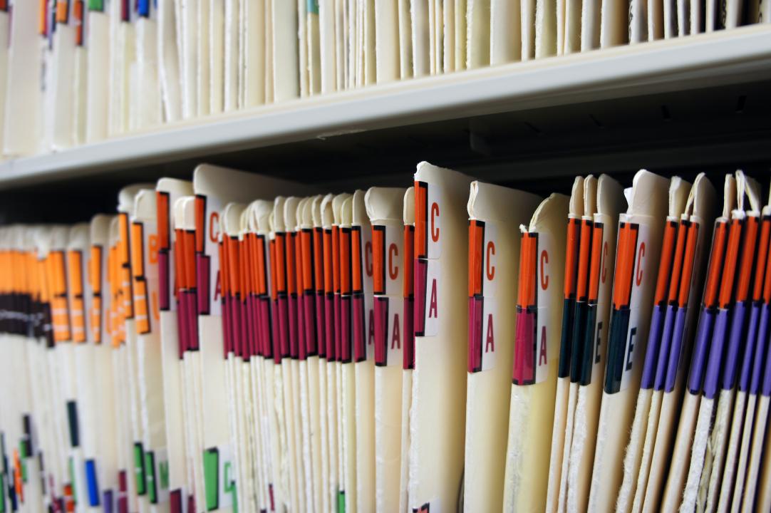 Medical records on a shelf