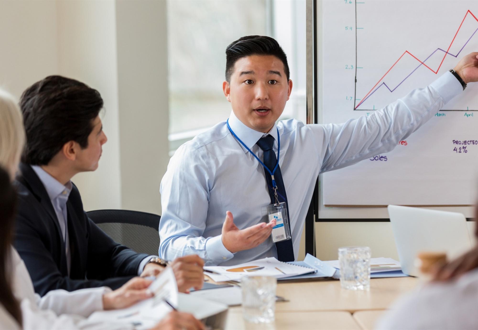 Businessman demonstrating a chart