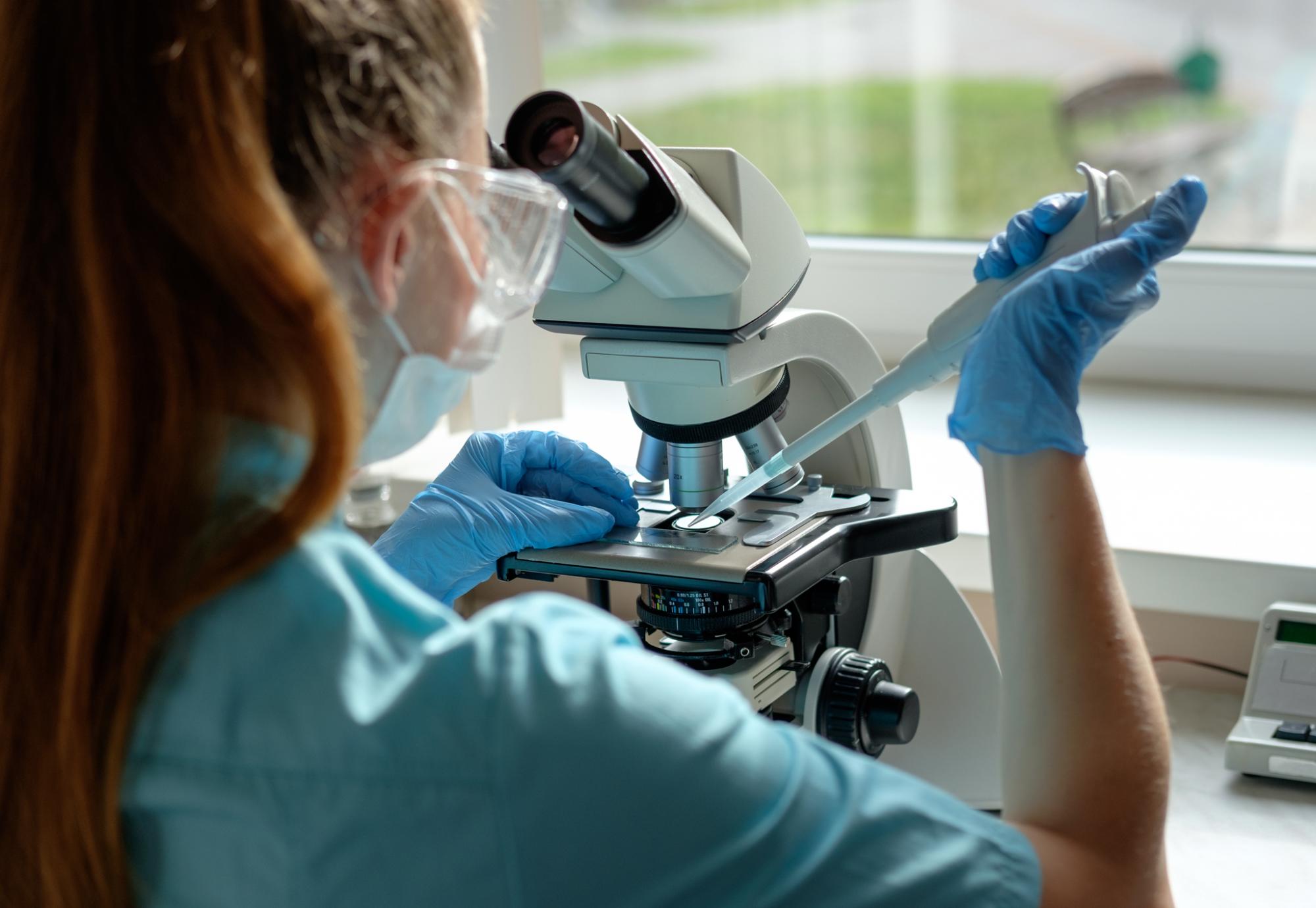 Female lab technician carrying out a test