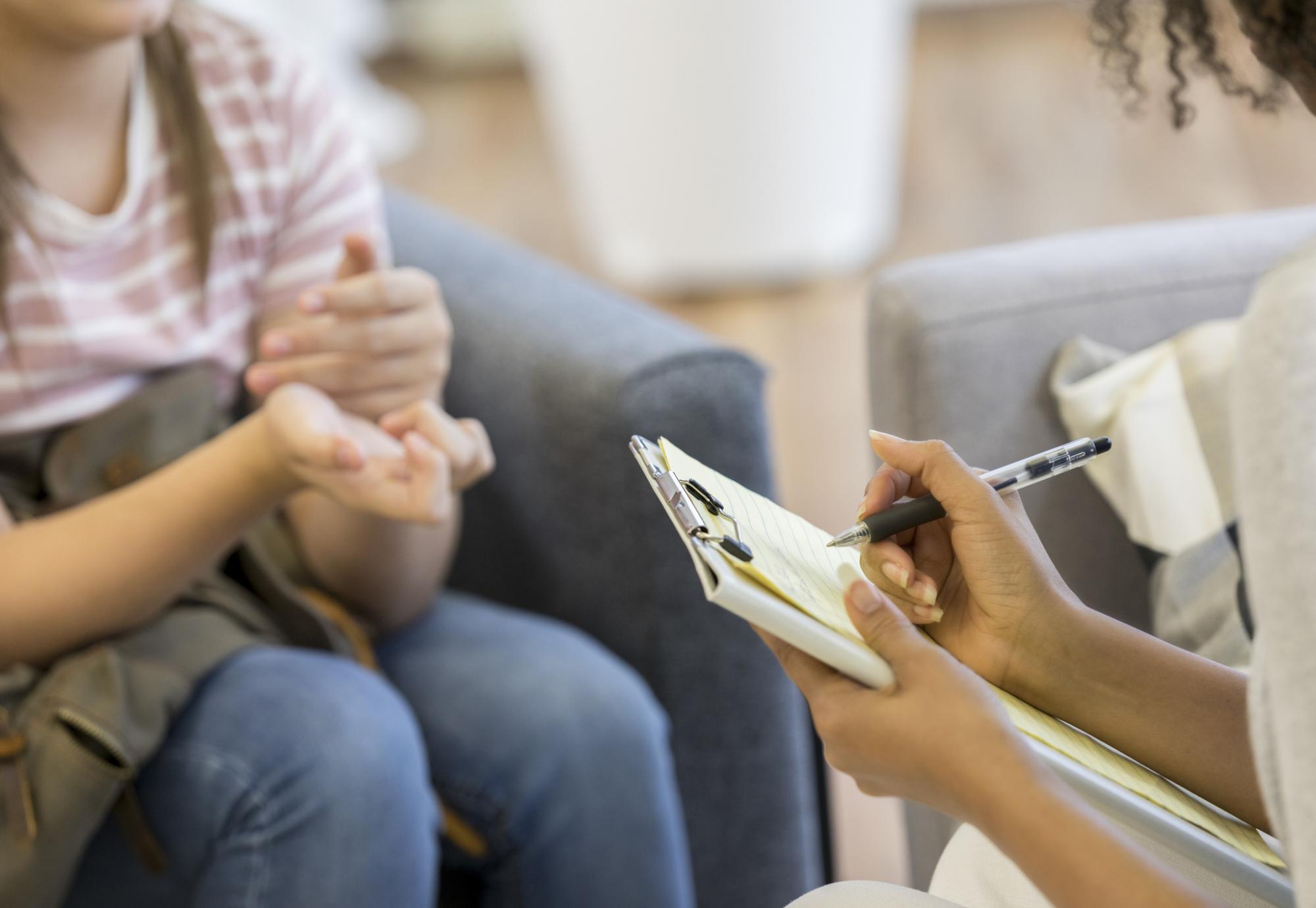 Young person talking to a health professional 