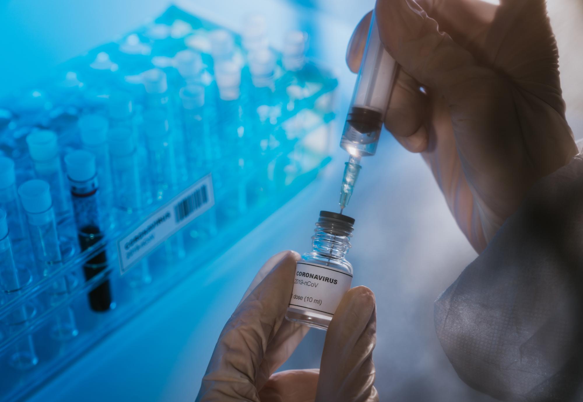 Vaccine bottle being filled