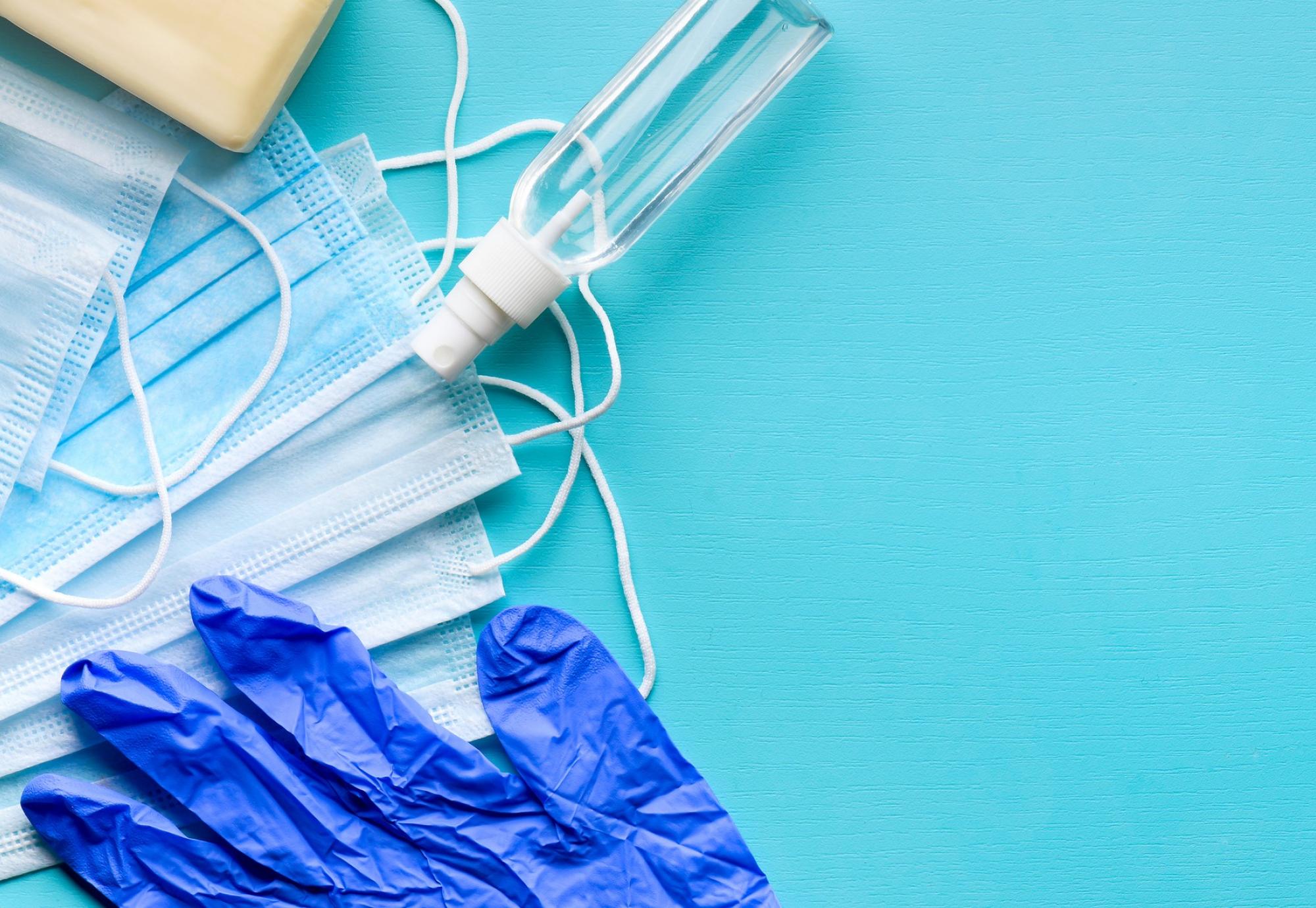 Assortment of PPE goods against a blue background