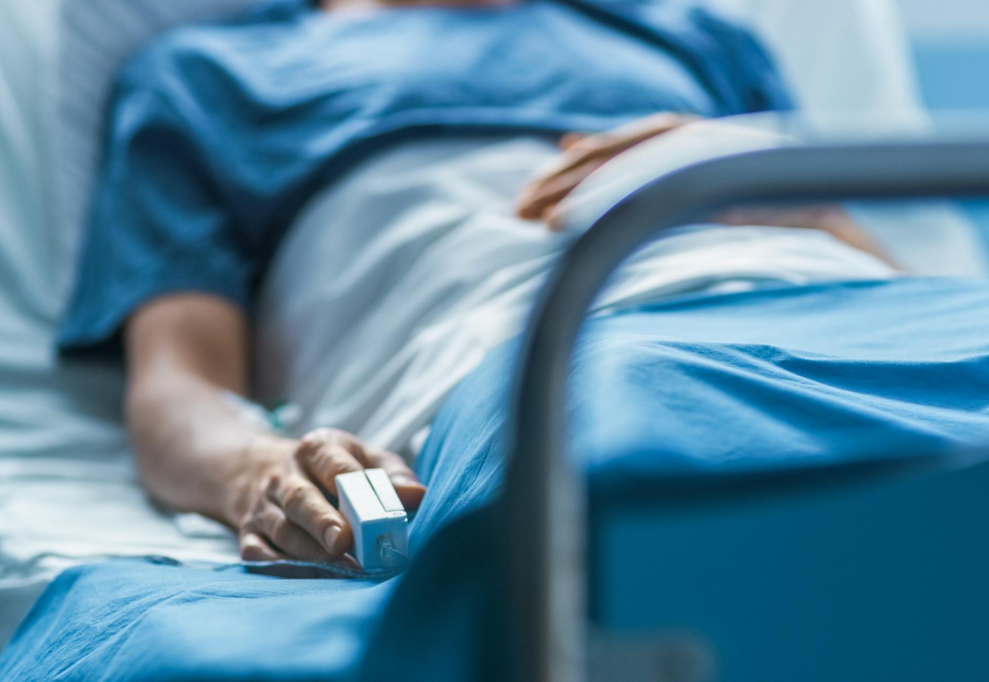 Patient lying in a hospital bed