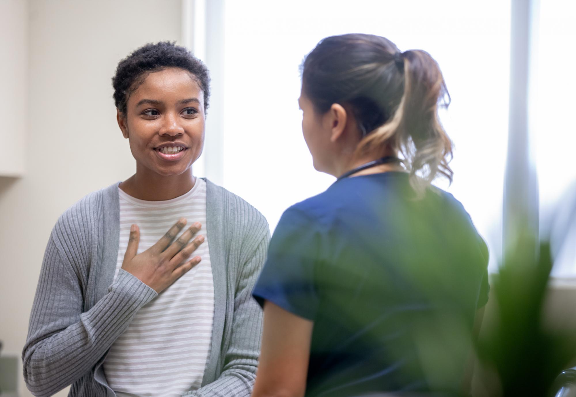 Patient having a conversation with a nurse