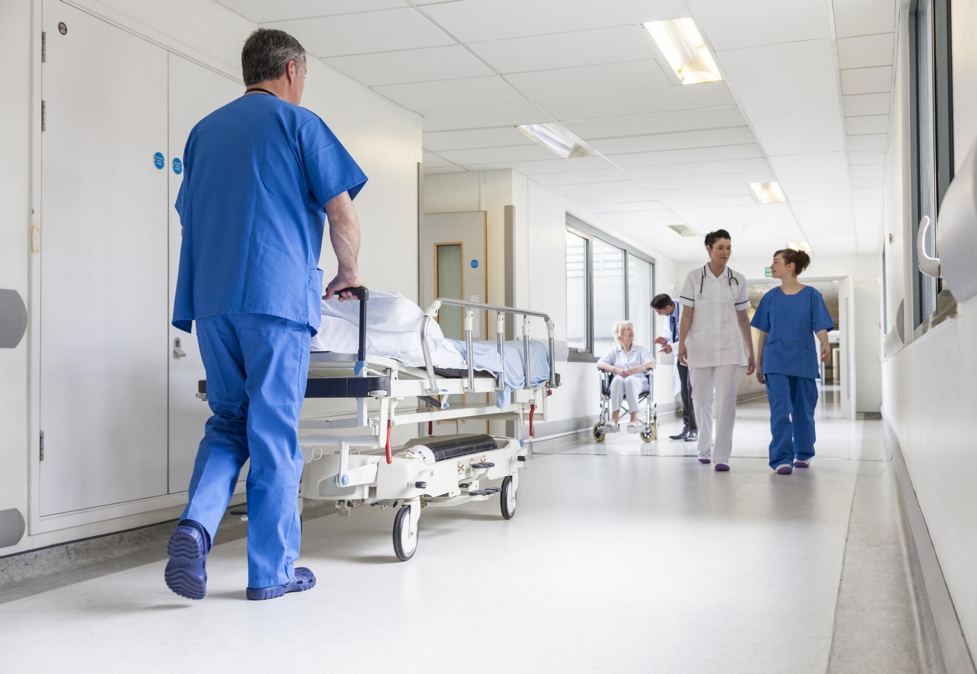 Hospital corridor full of activity