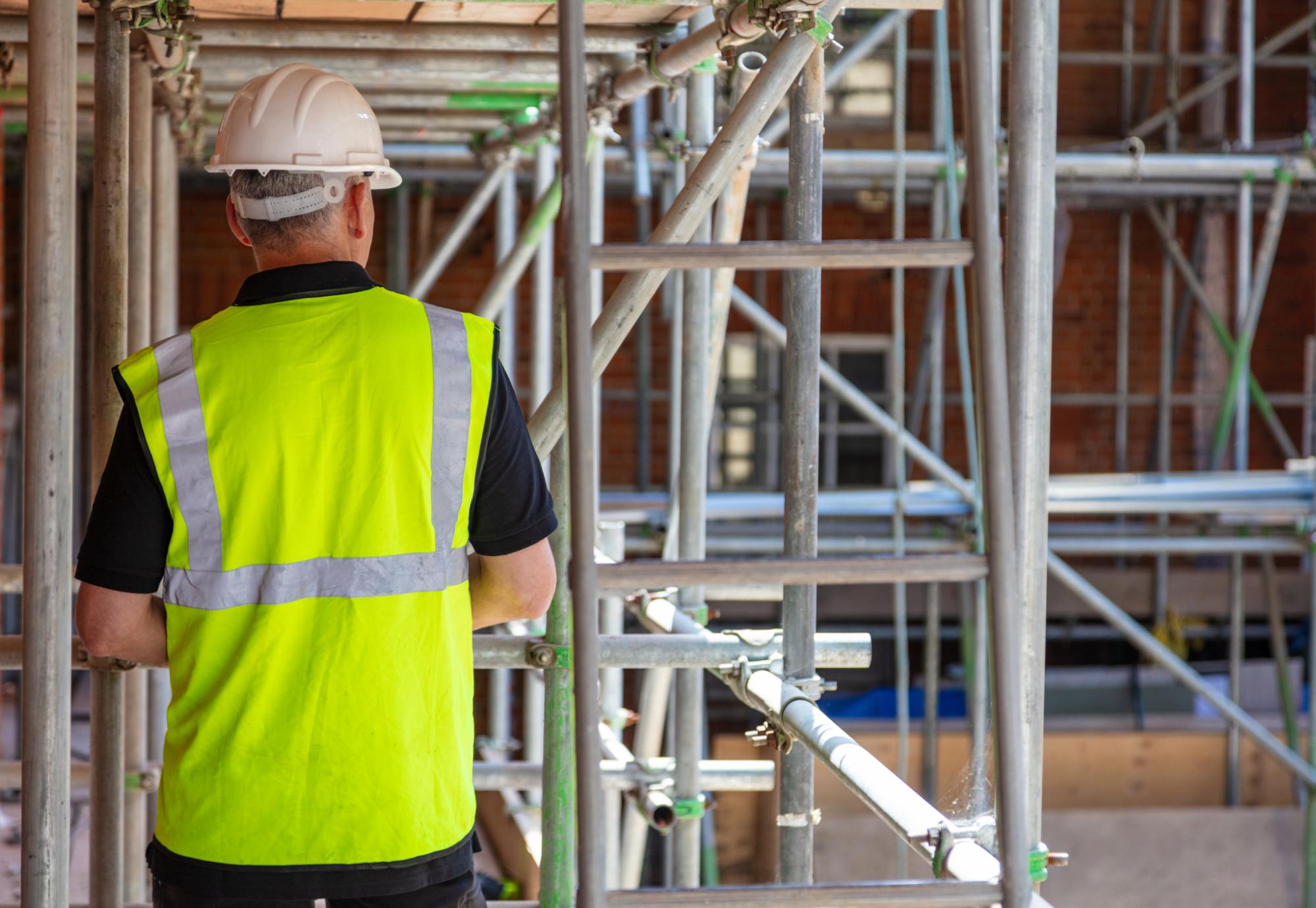 Construction worker on scaffolding