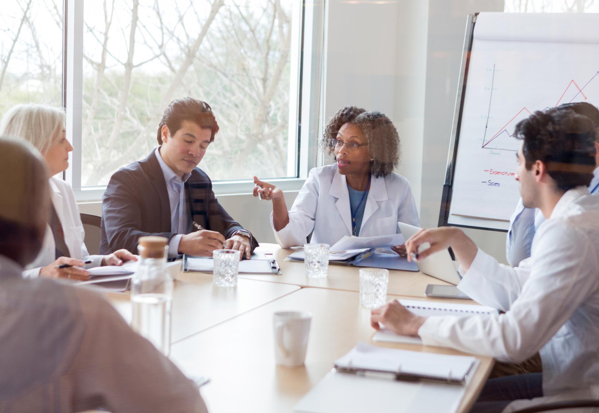 Health professionals discussing in a group setting