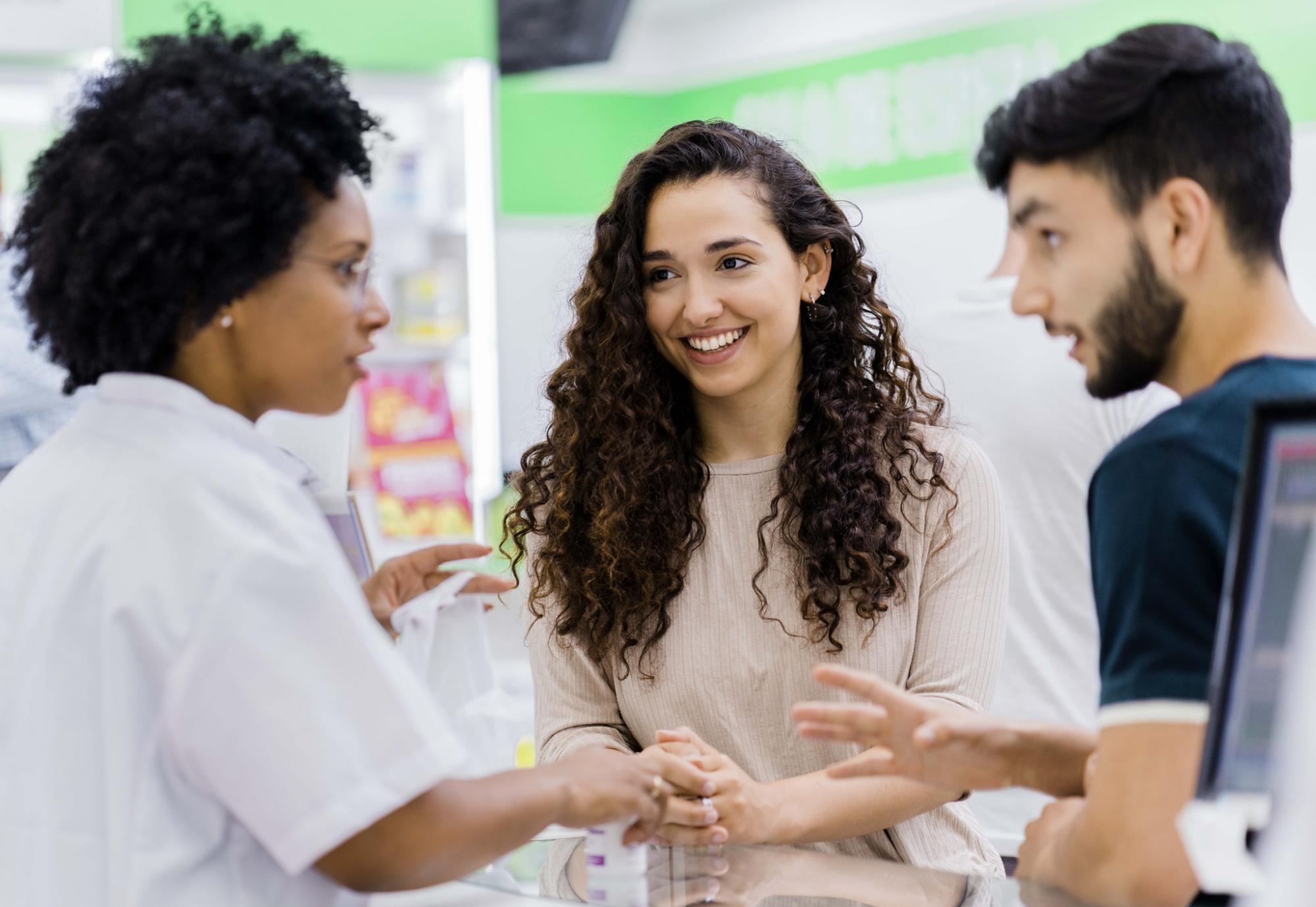 Pharmacist providing expert advice to customers