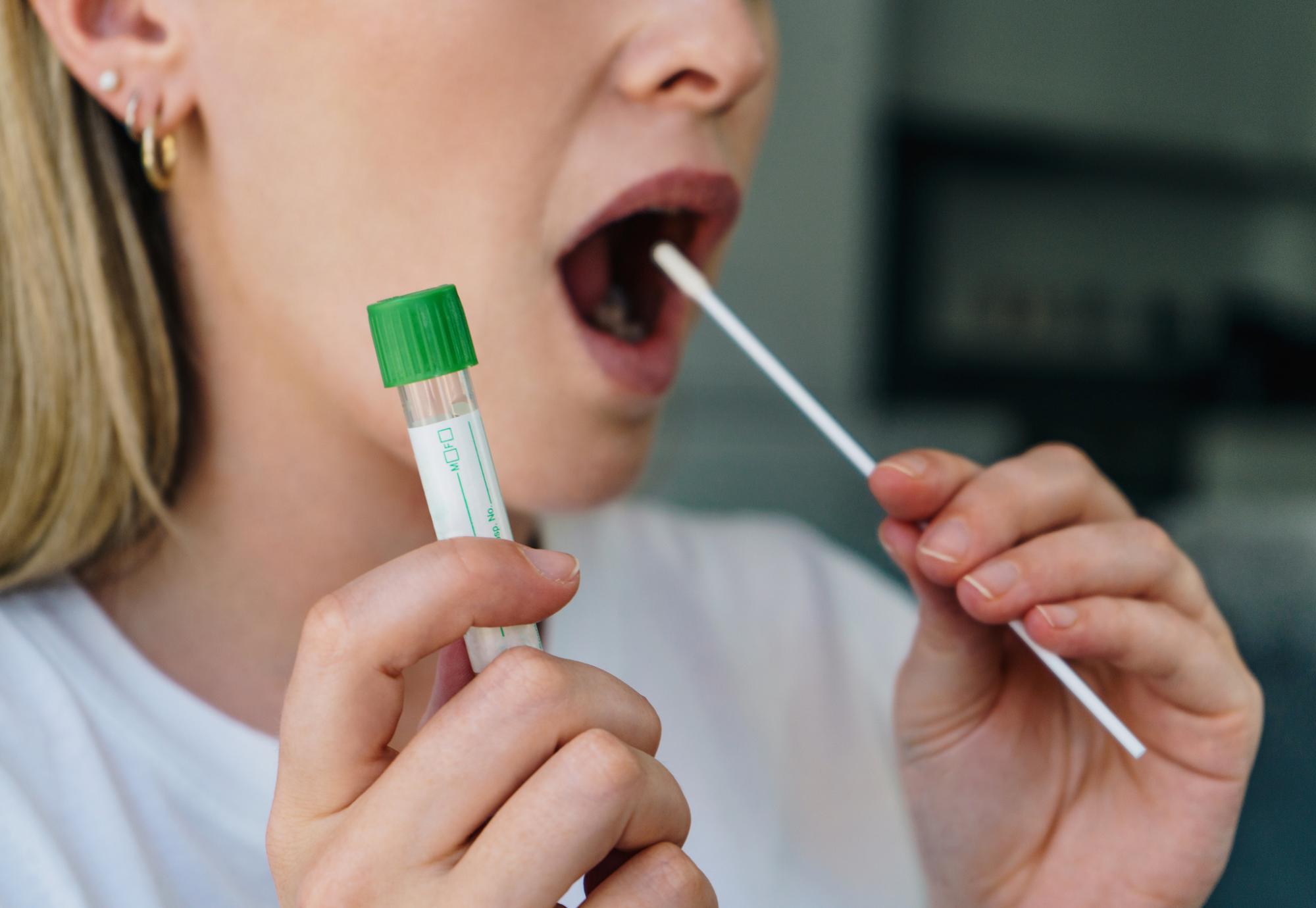 Woman carries out a self swab