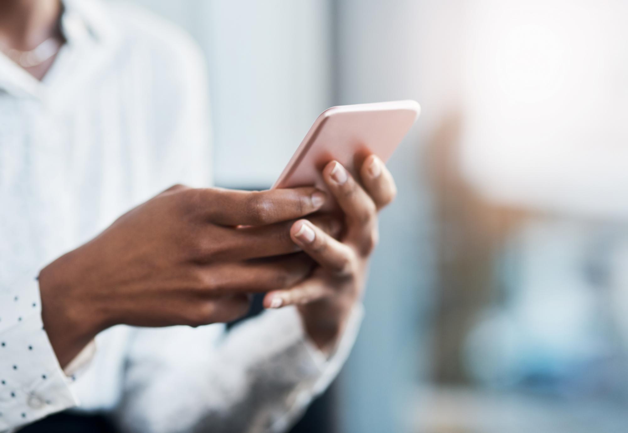 Woman using her mobile phone