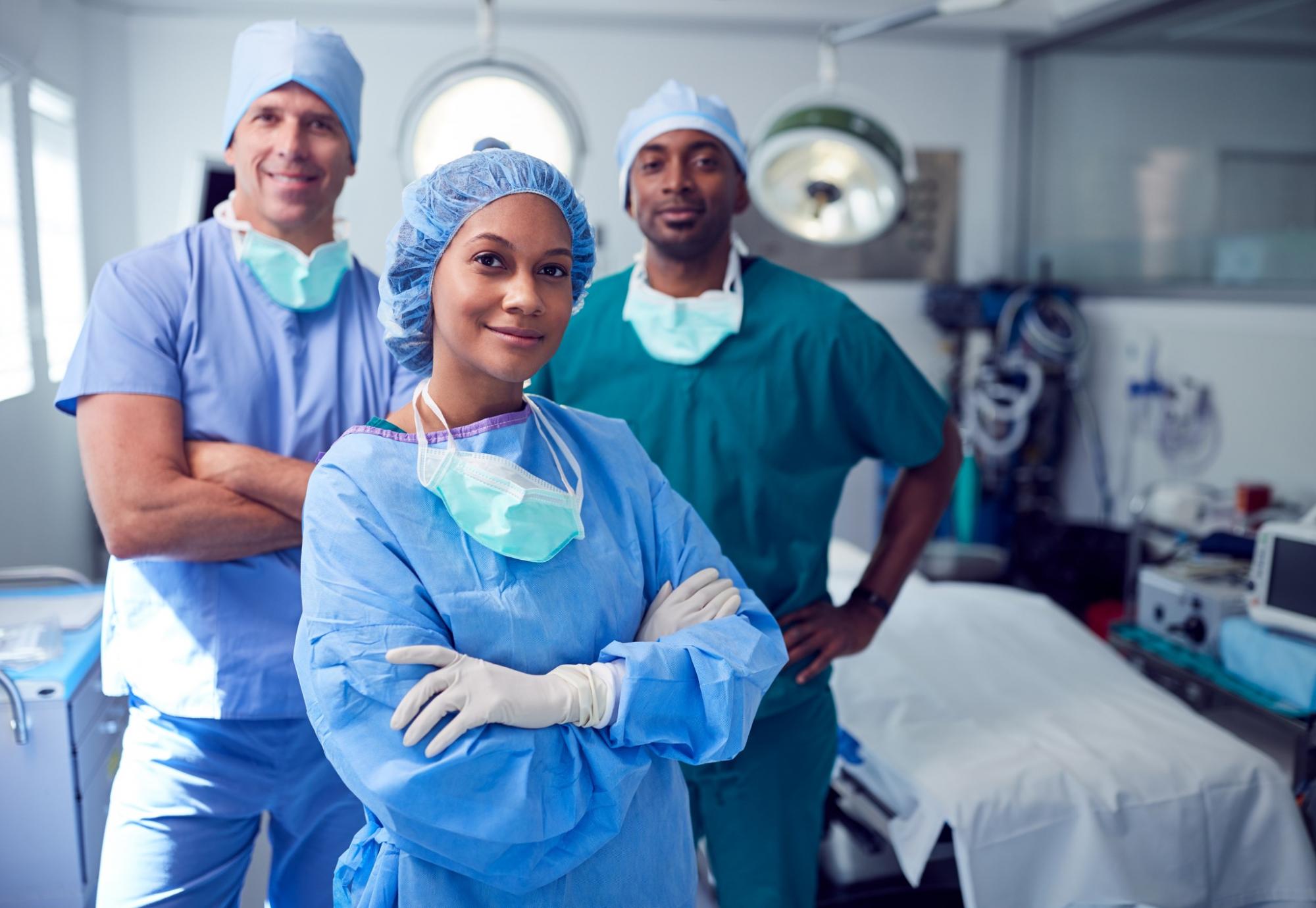 Group of medical colleagues in an operating theatre