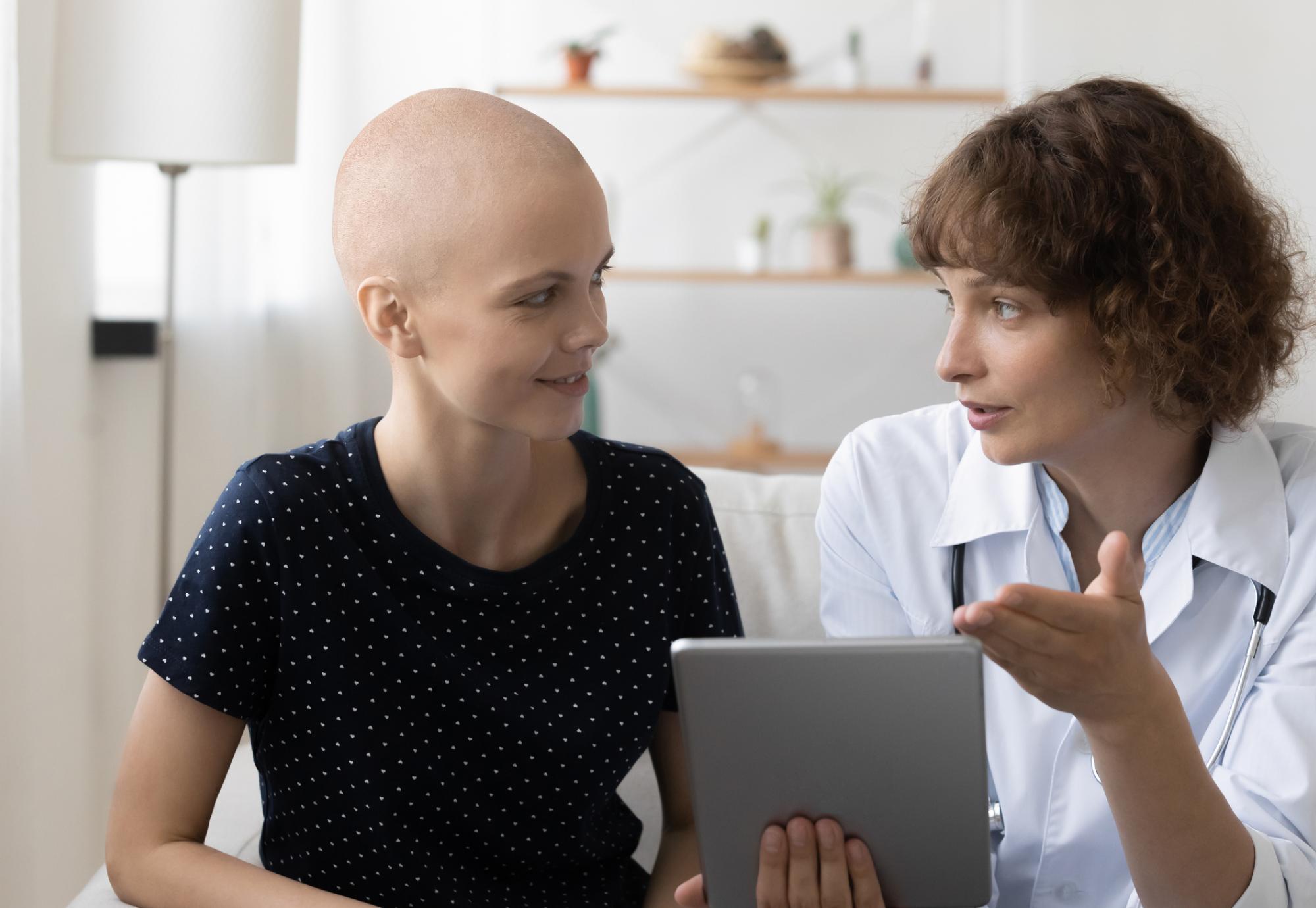 Cancer patient talking with a doctor