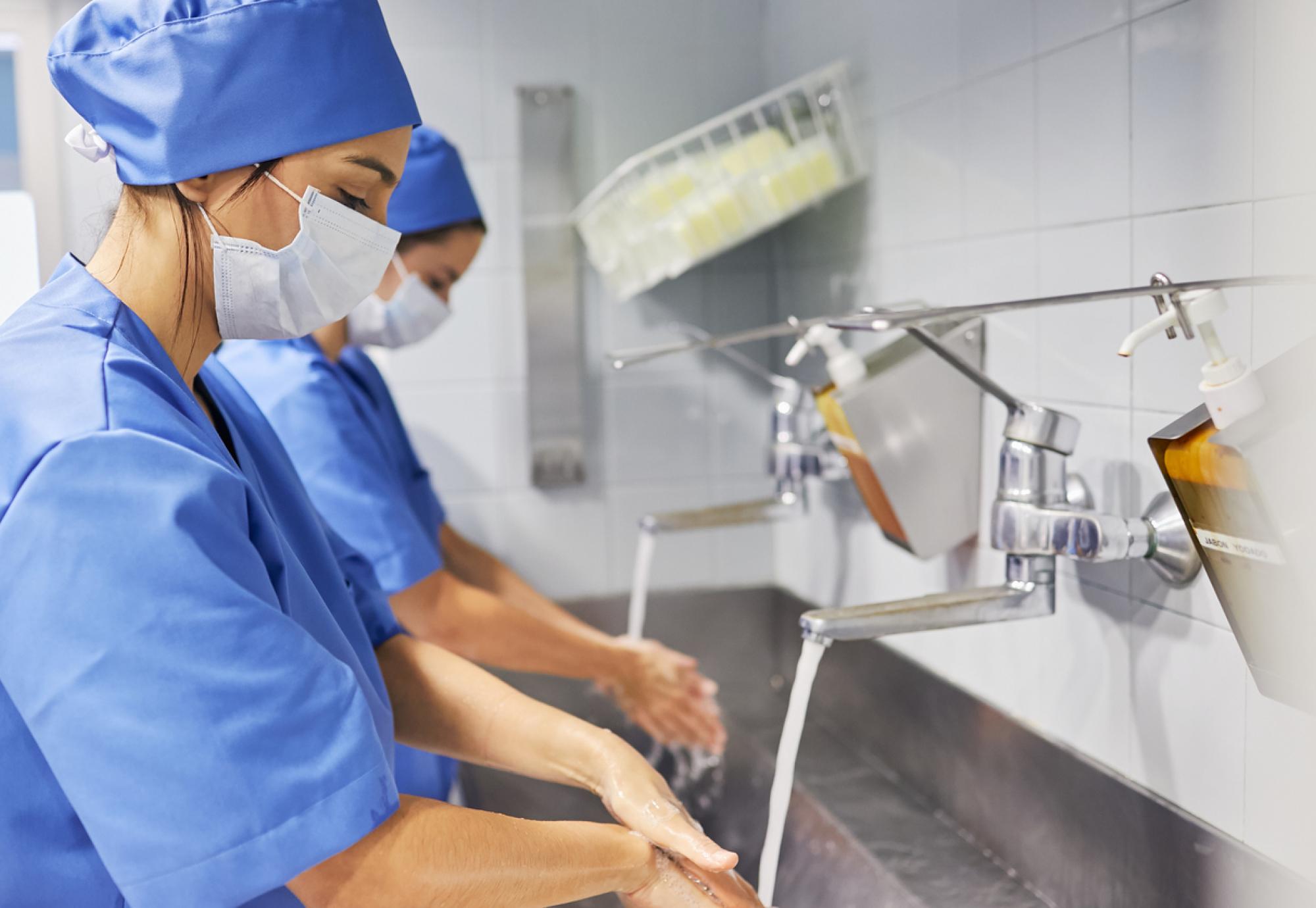 Surgeons washing hands