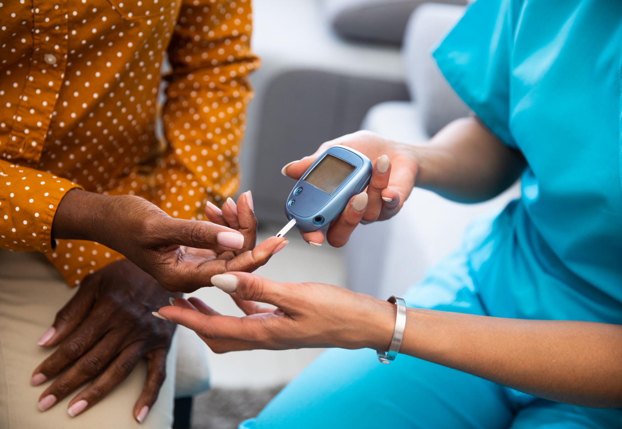 woman having blood pressure taken