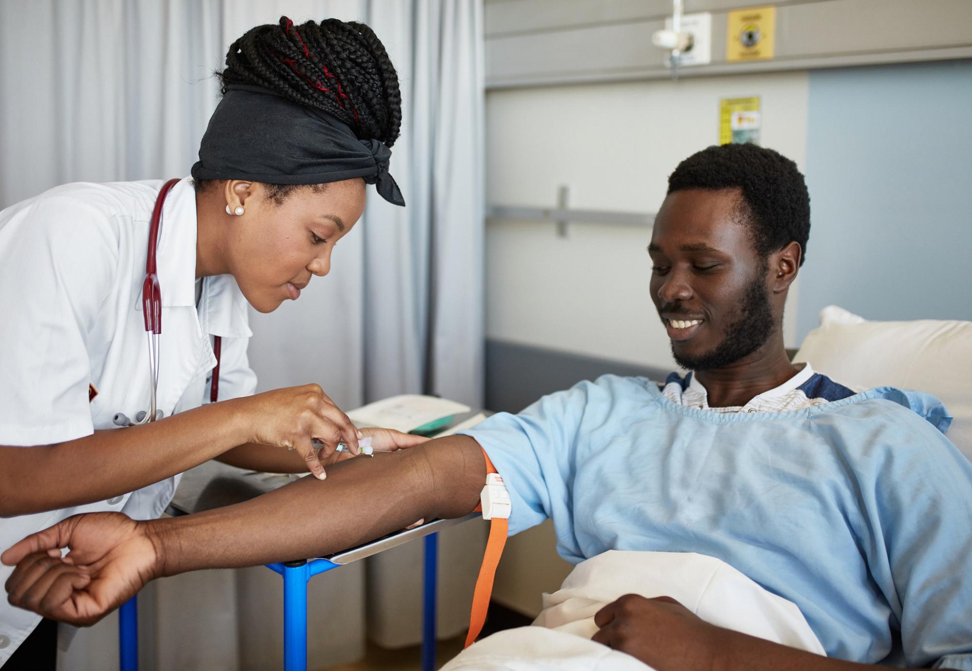 Black African man donating blood