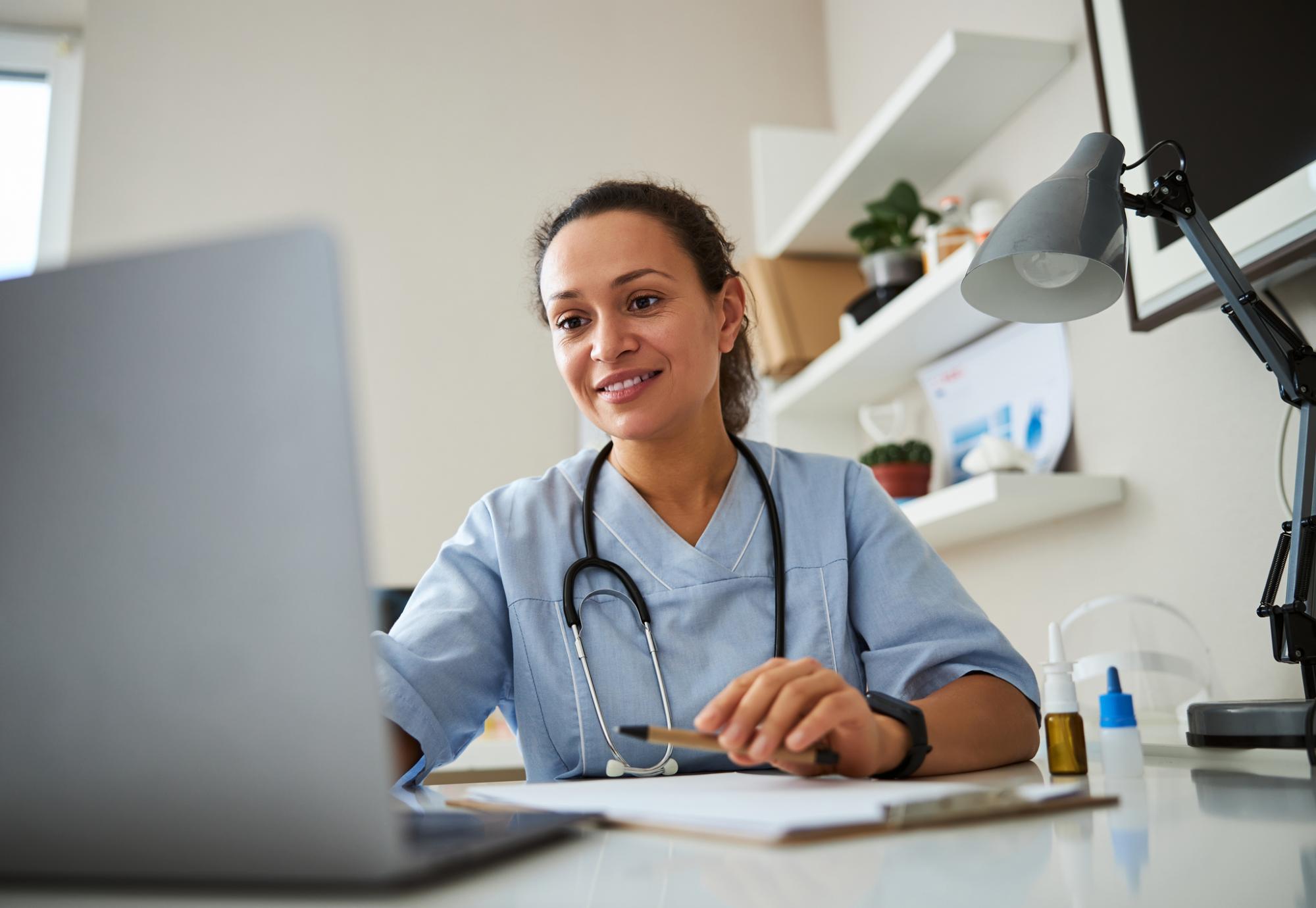 GP using a computer for a remote appointment