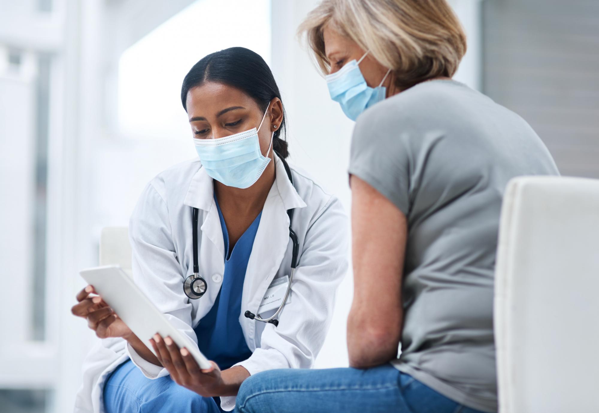 Doctor and patient discussing treatment results