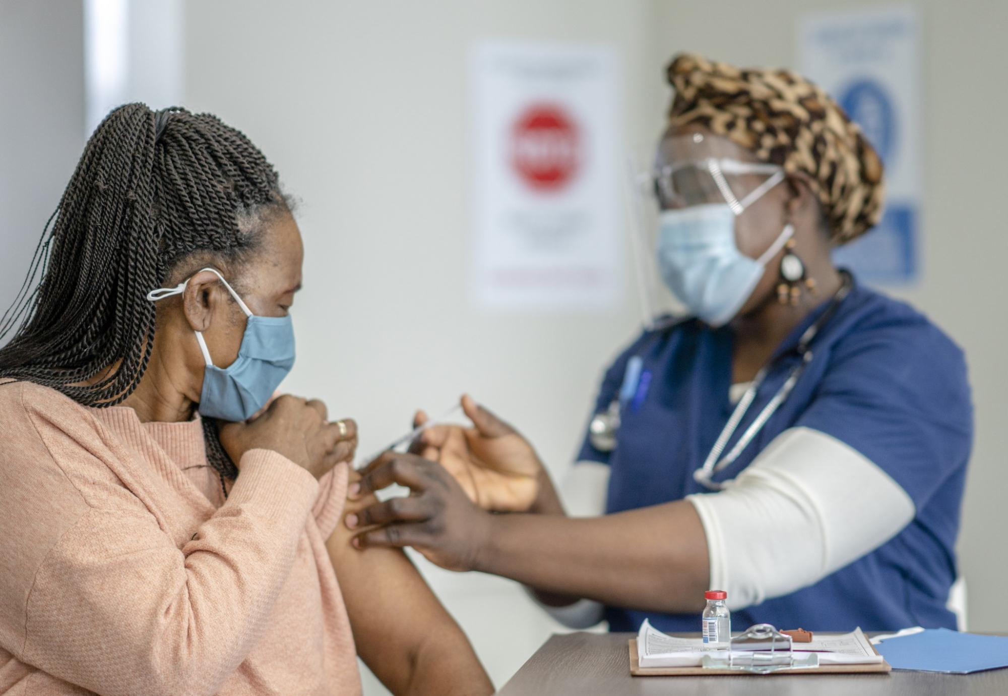 BAME person getting vaccinated 