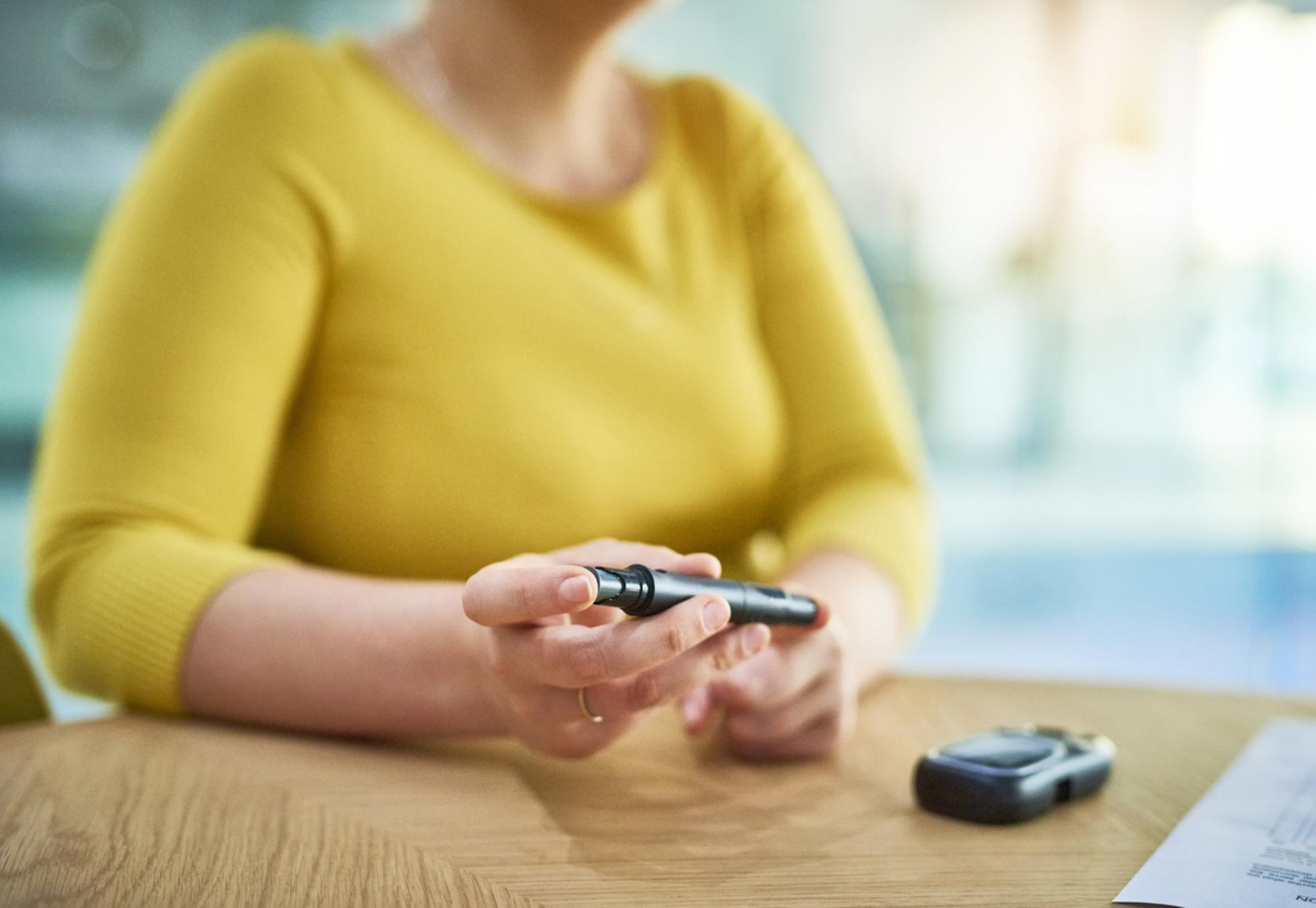 woman checking insulin levels