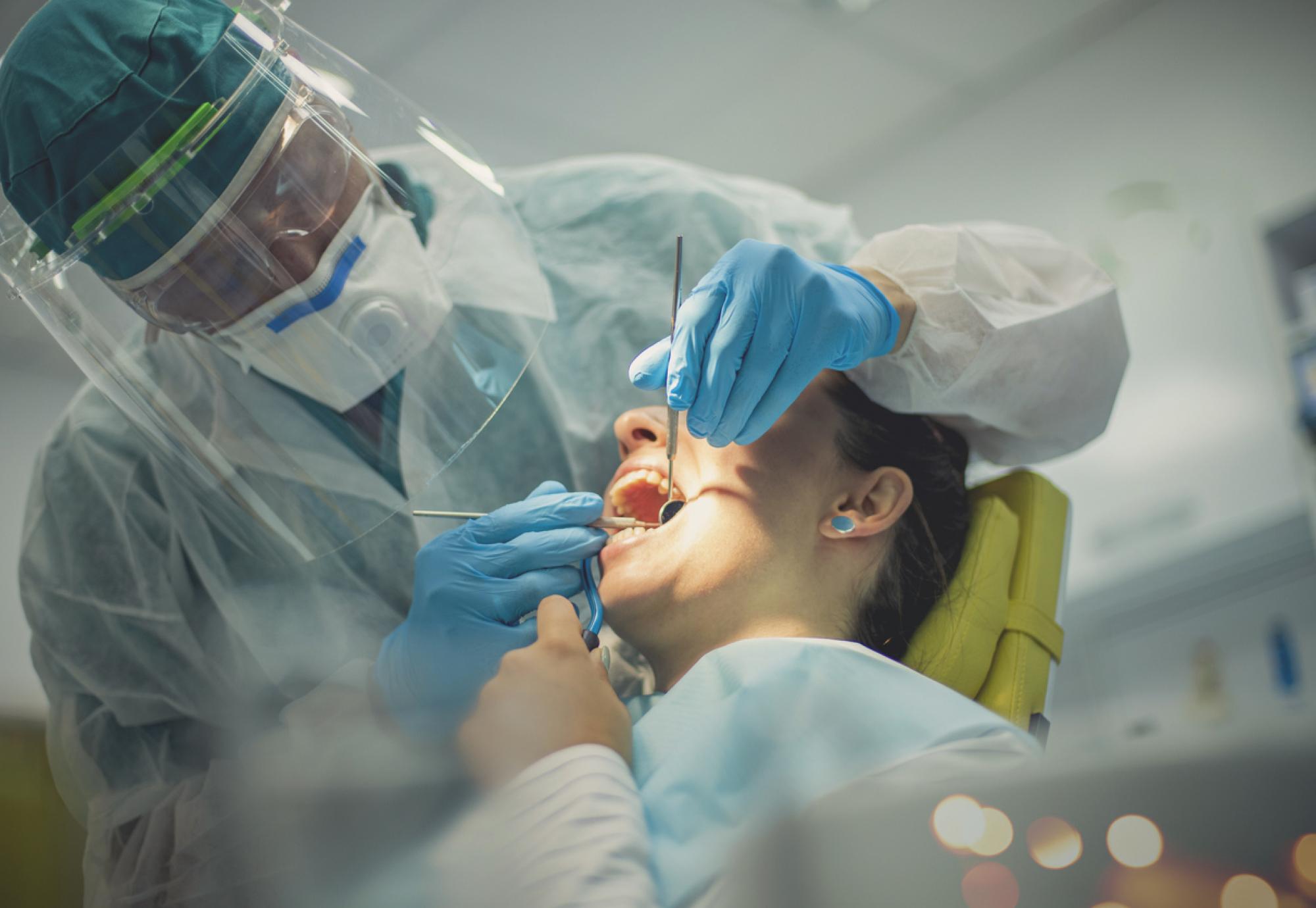 dentist with patient 