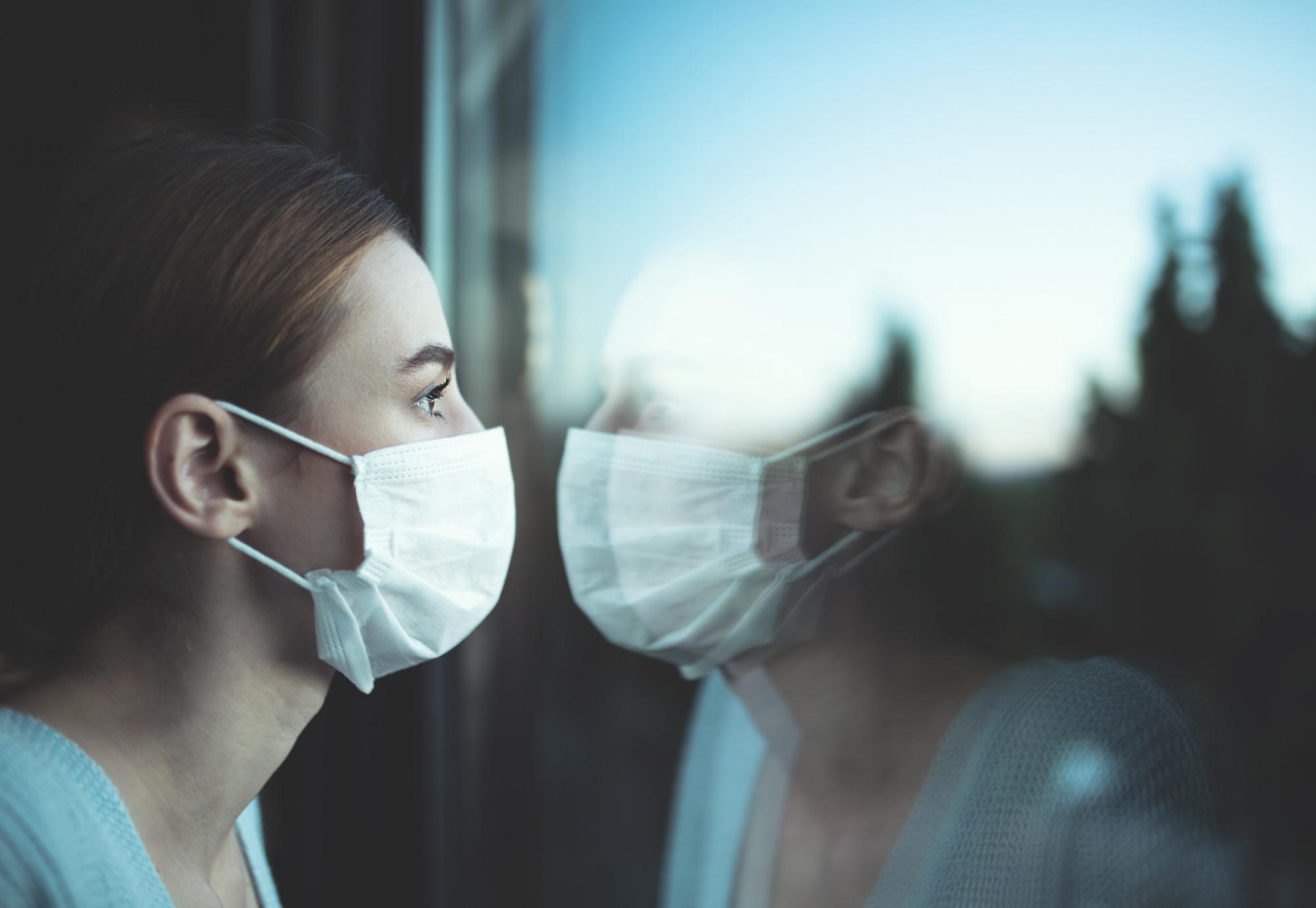 nurse looking out window 