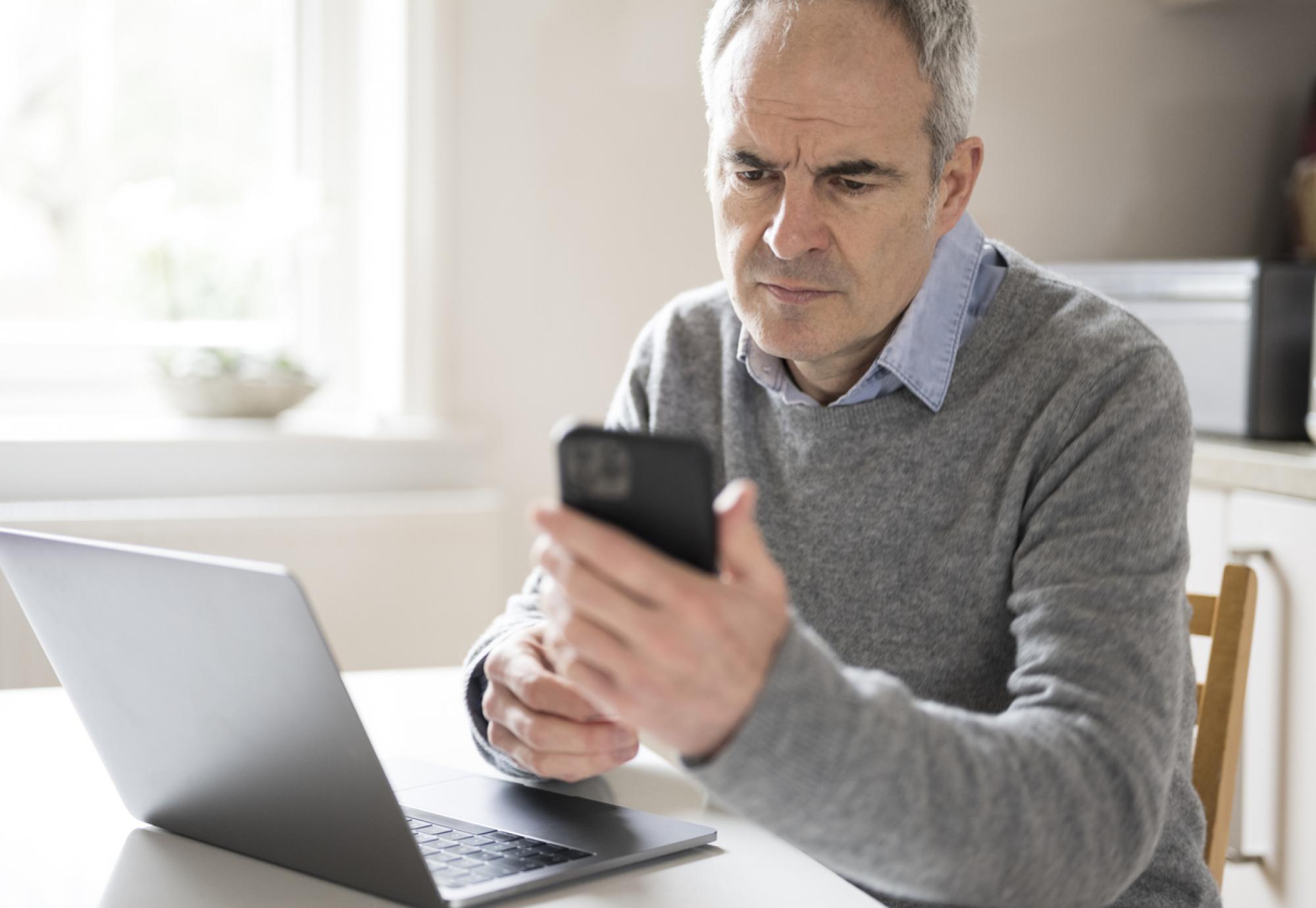 man using smartphone