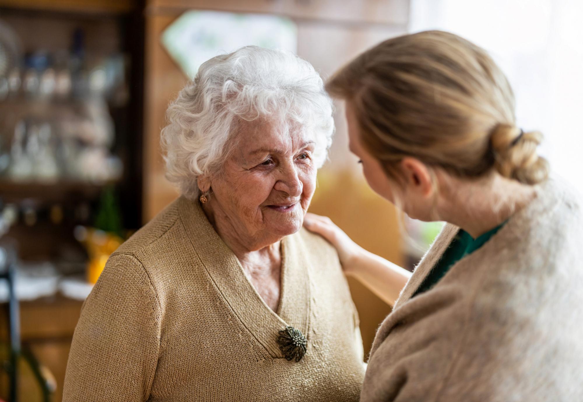 elderly lady with carer