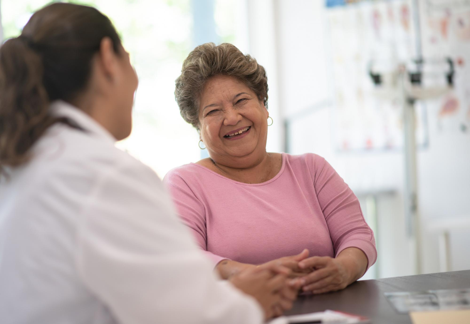 Woman consulting doctor