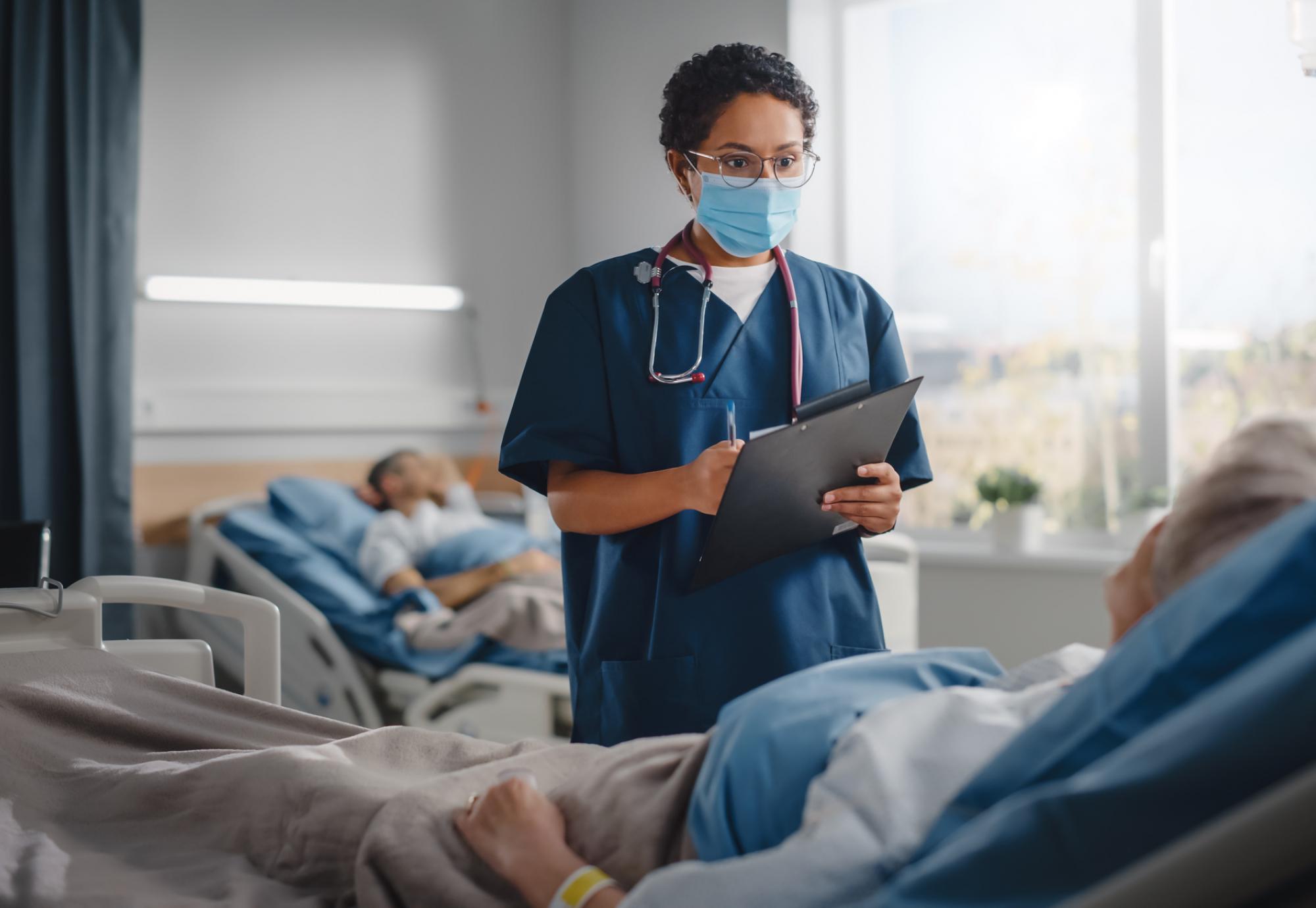 Nurse doing a ward round in a hospital