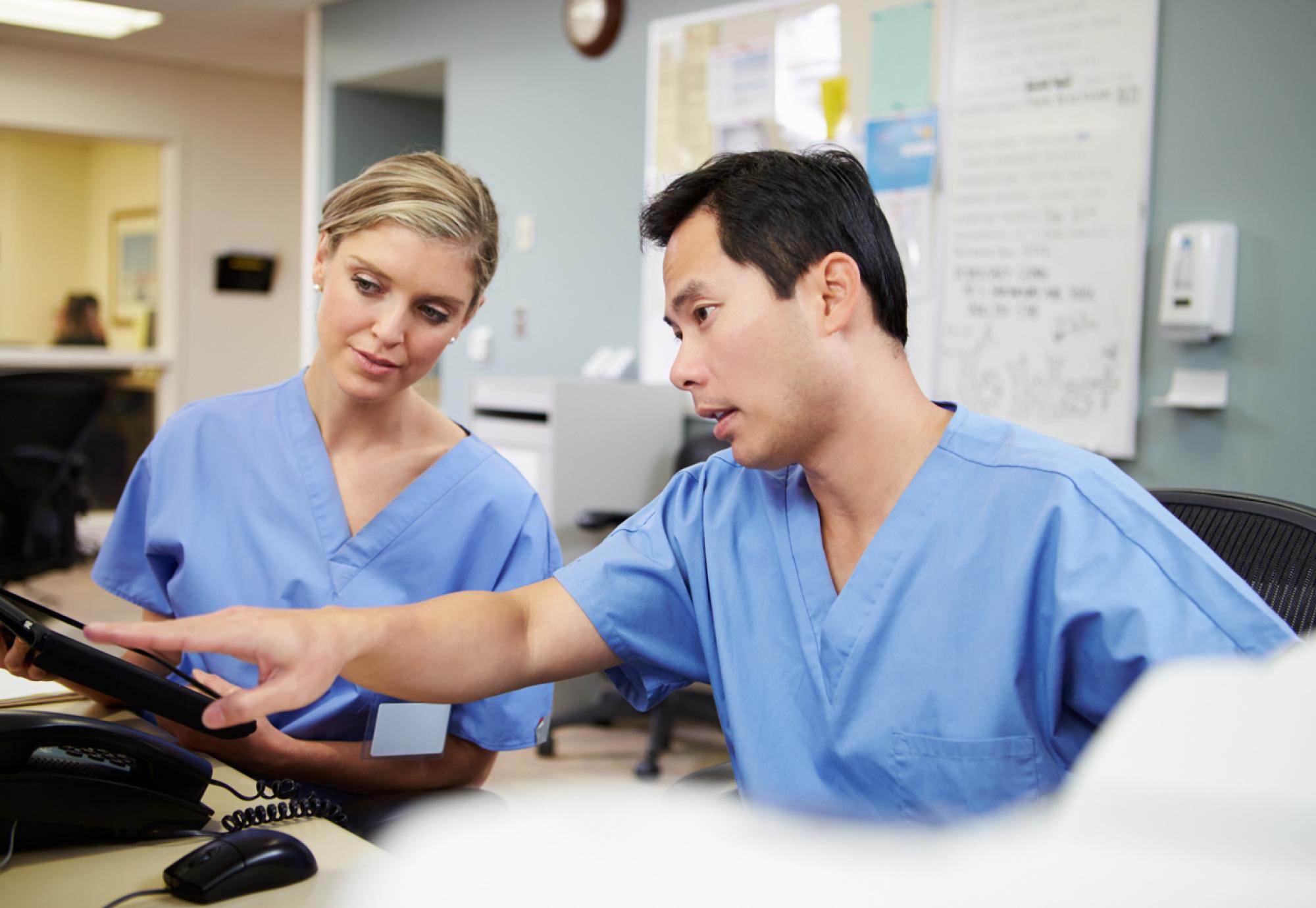 two nurses talking