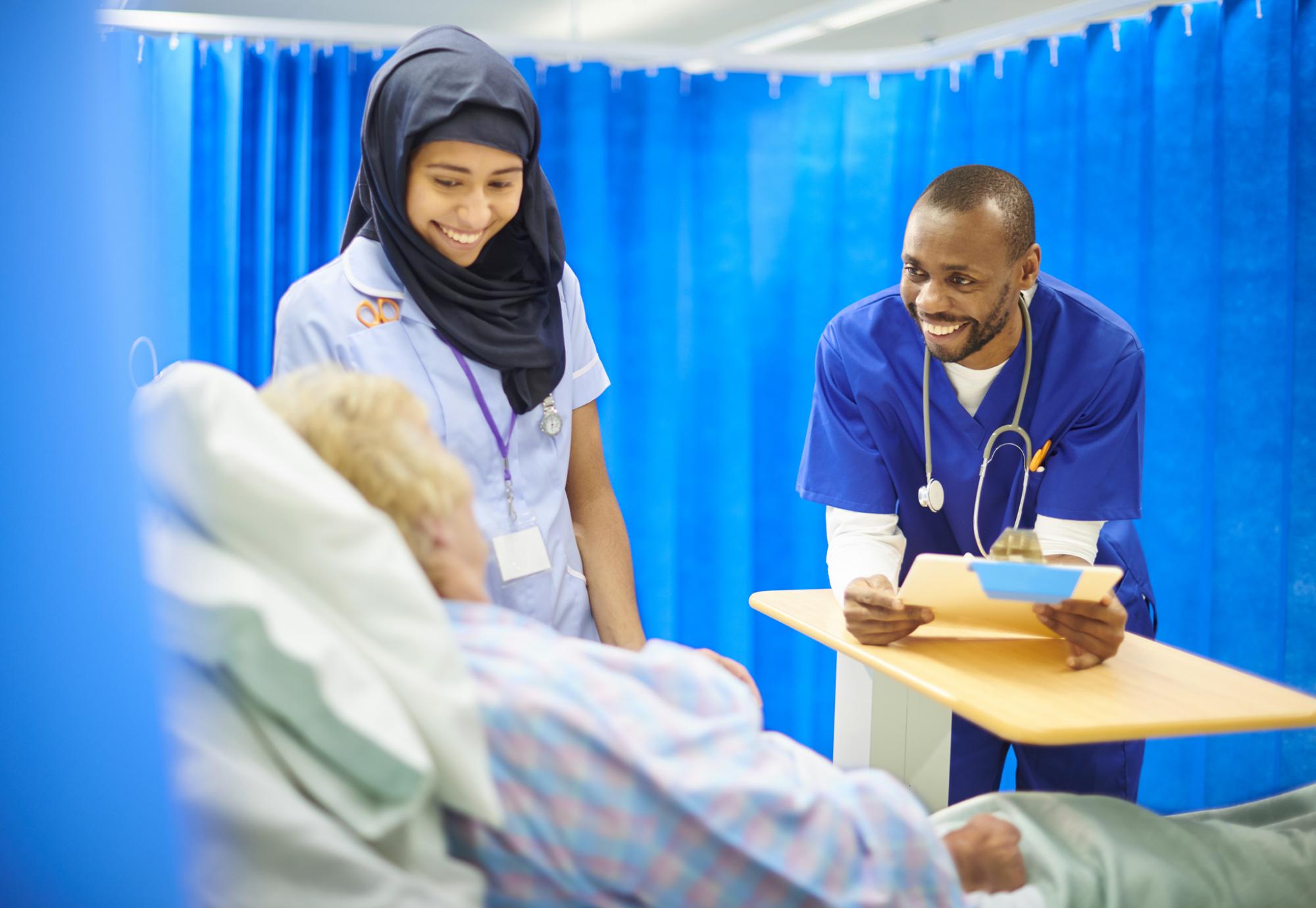 Nurses talking with a patient