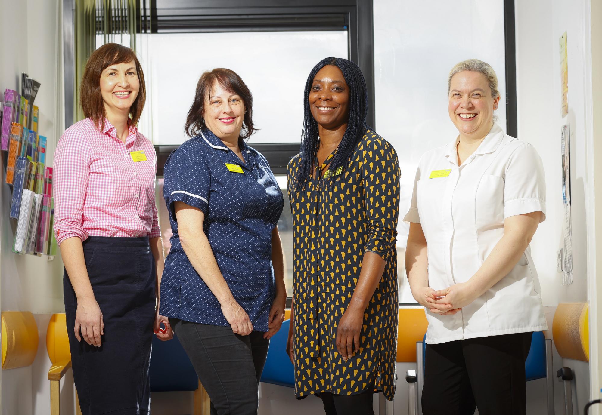 Healthcare workers smiling for a picture