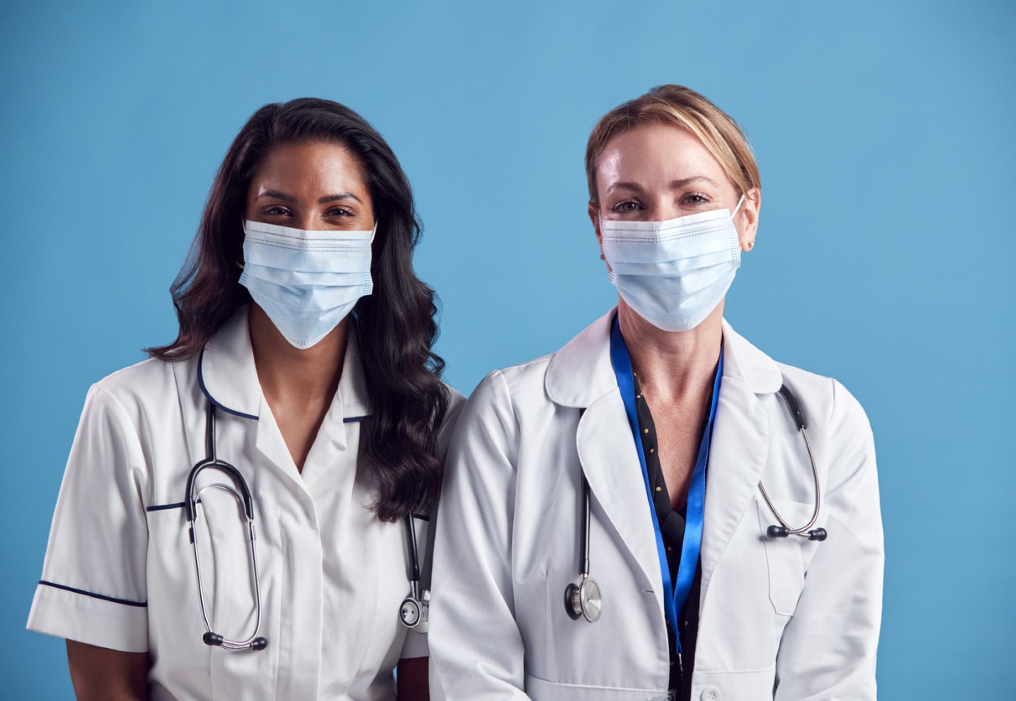 Doctor and nurse wearing face masks