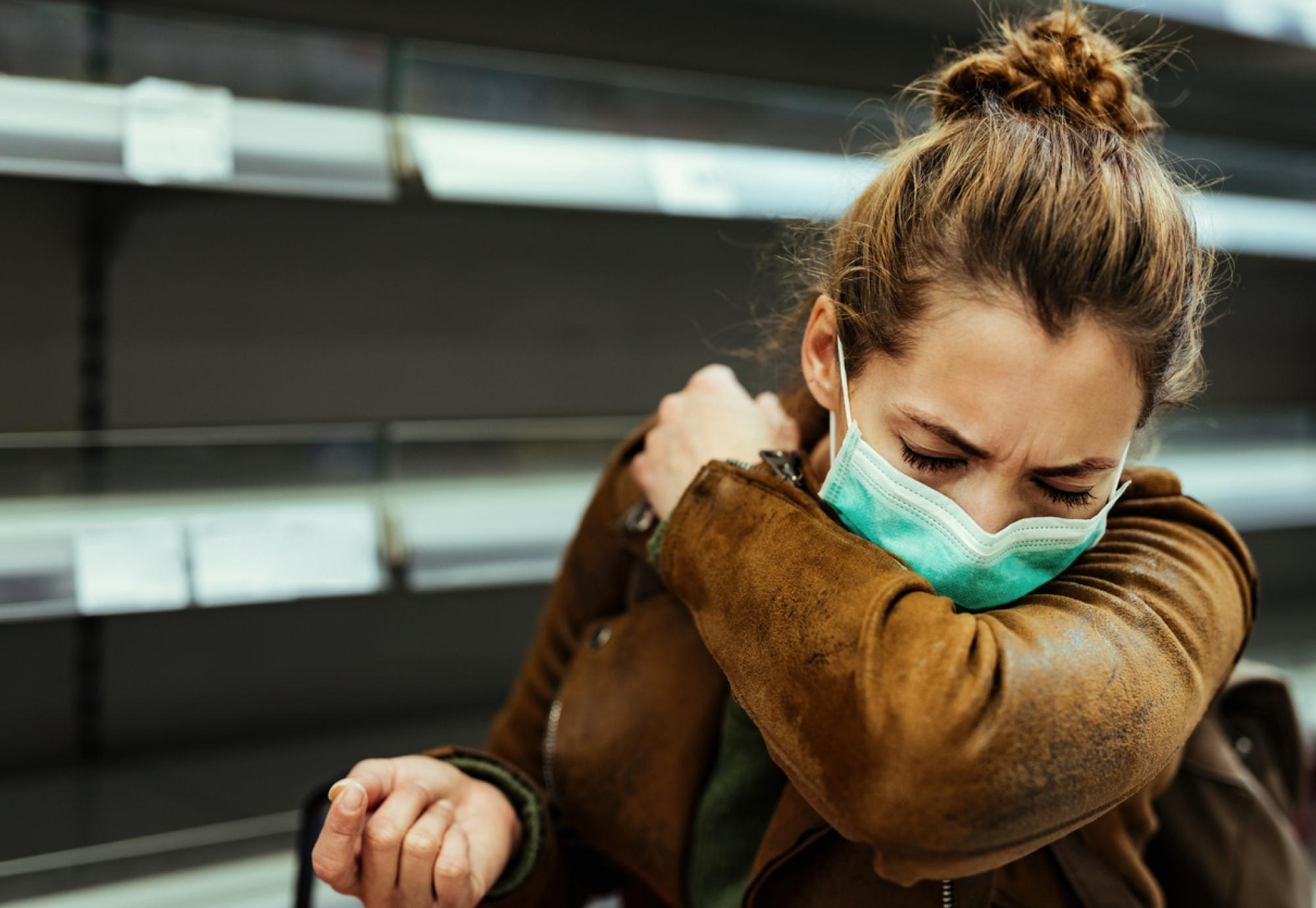 Woman coughing