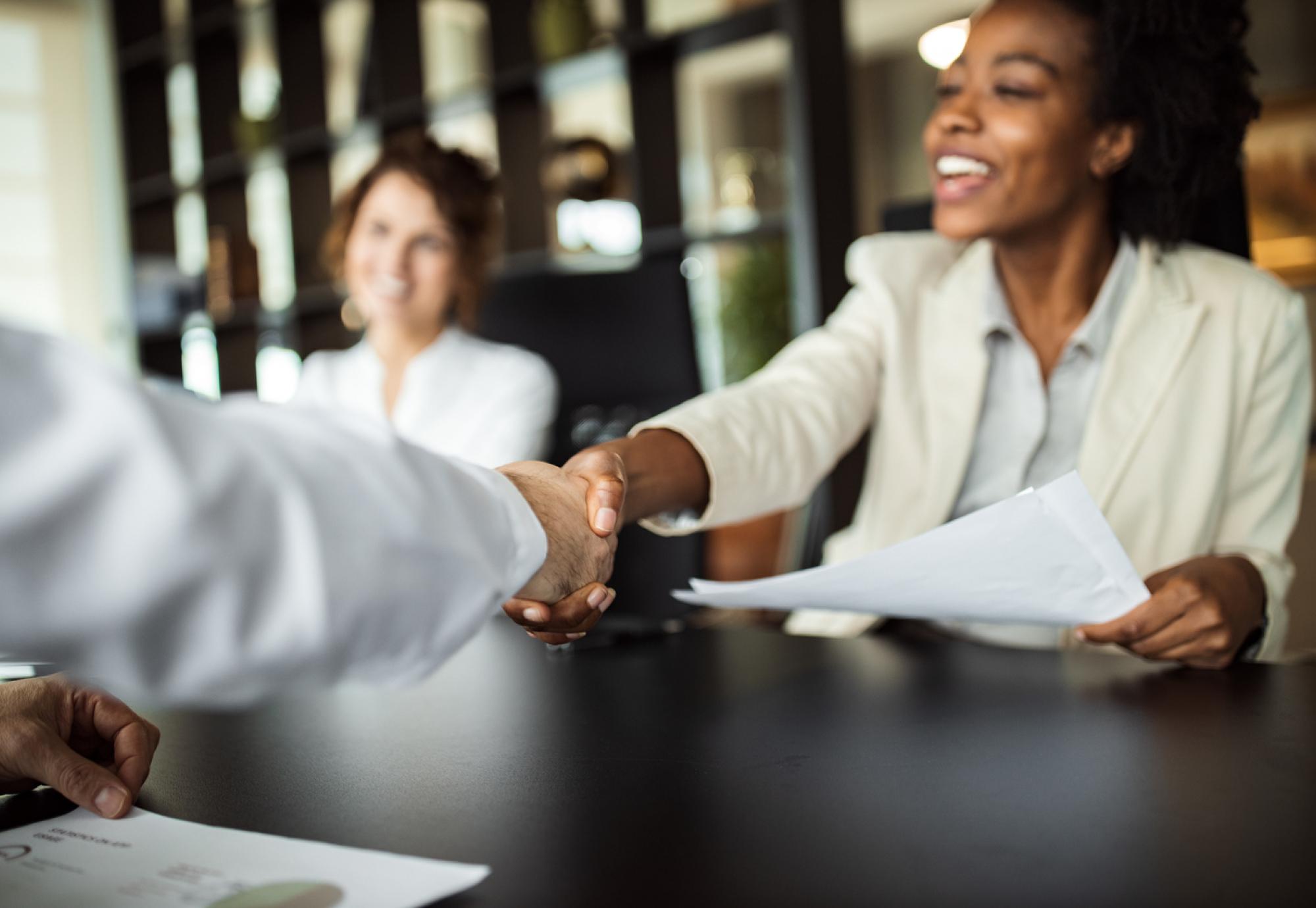 Two people shaking hands