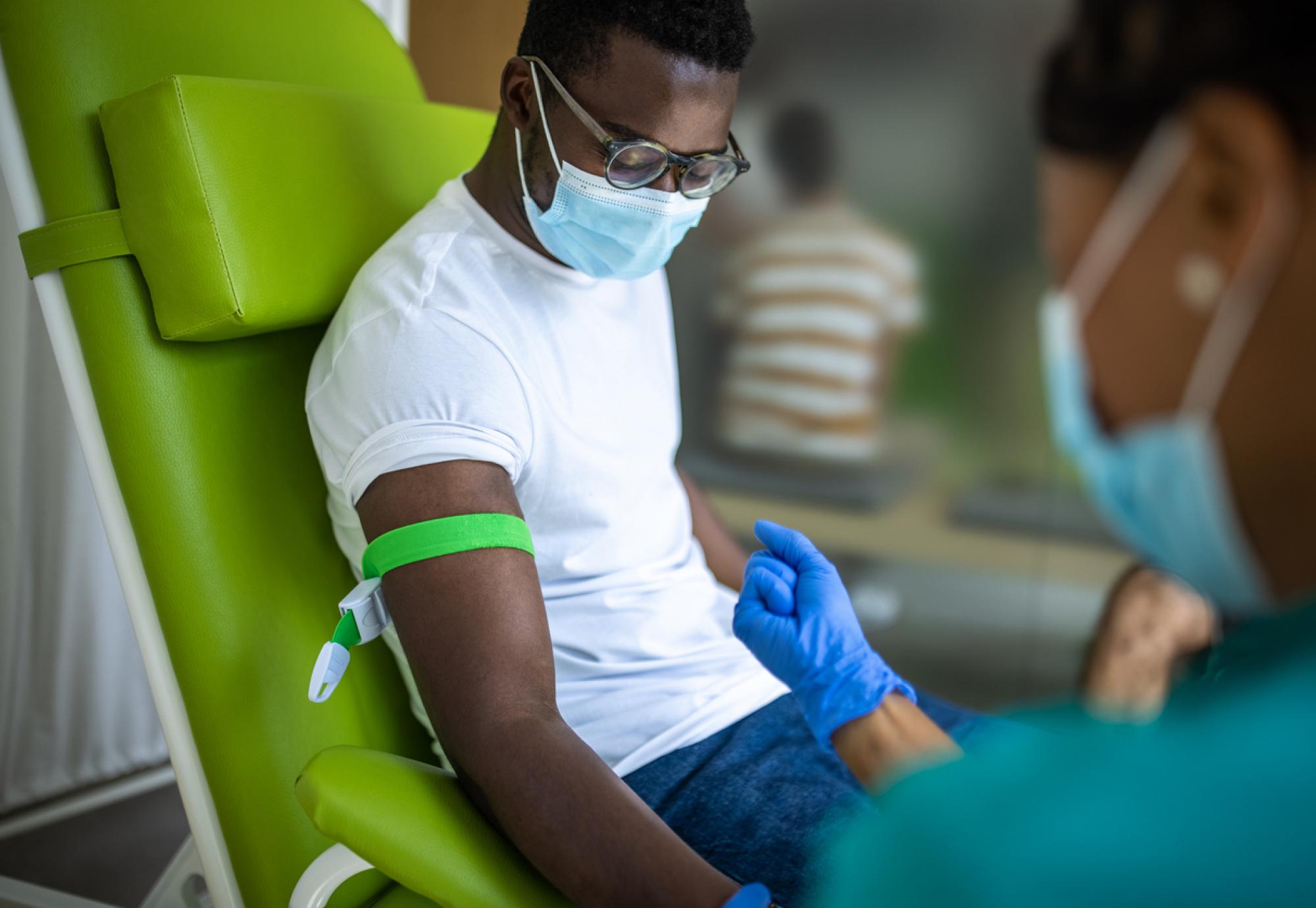 Black man donating blood