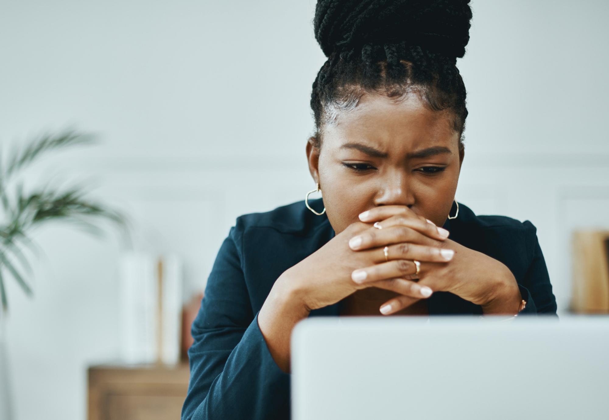 Young woman looking at computer