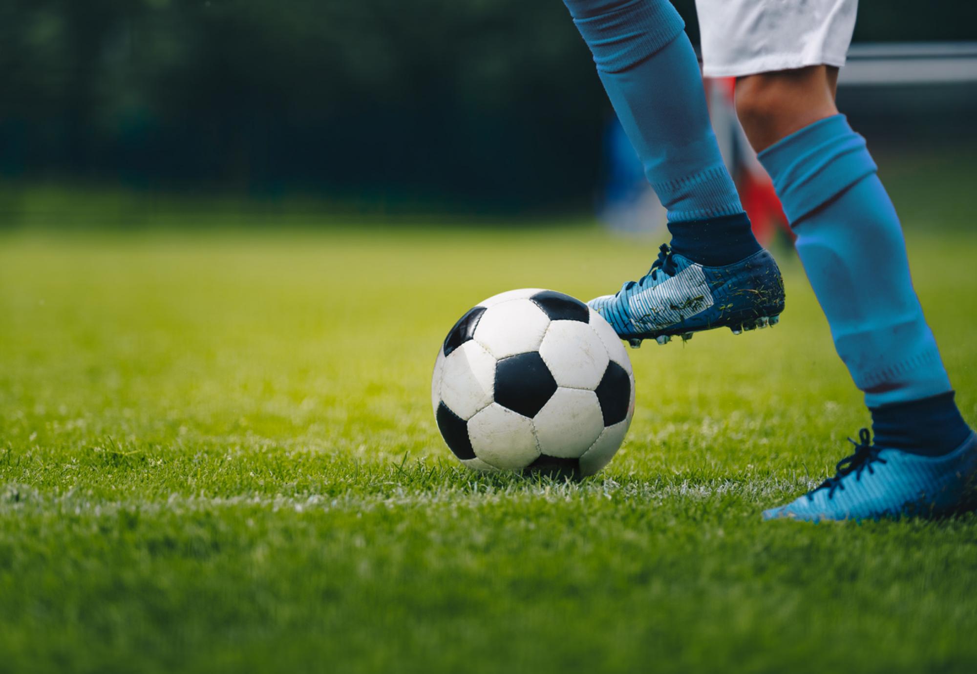 Close up of a person playing football