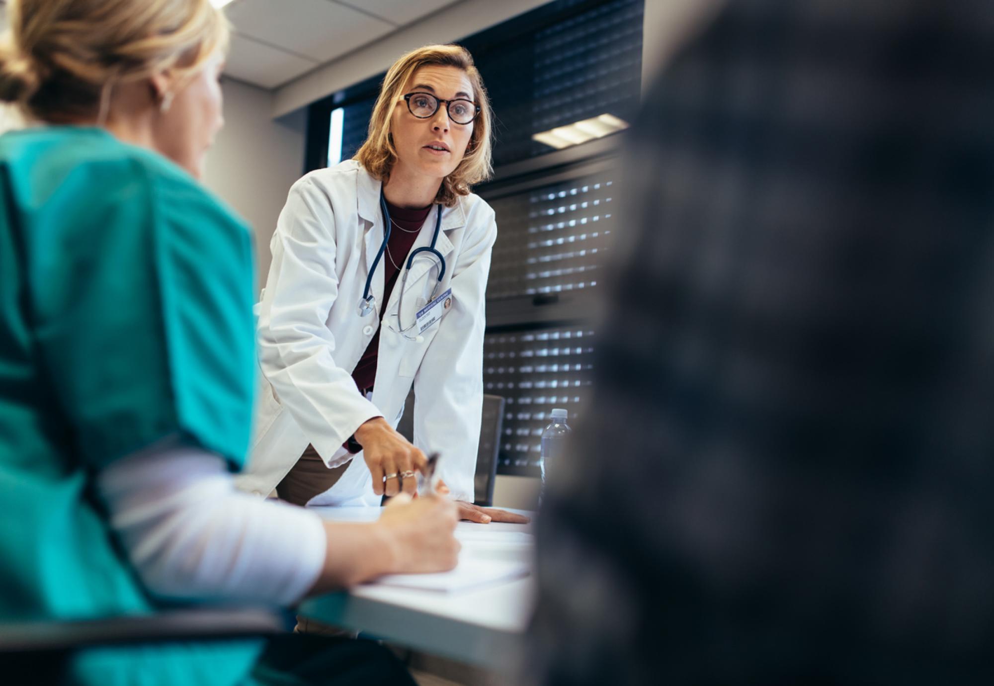 Female doctor in a team meeting